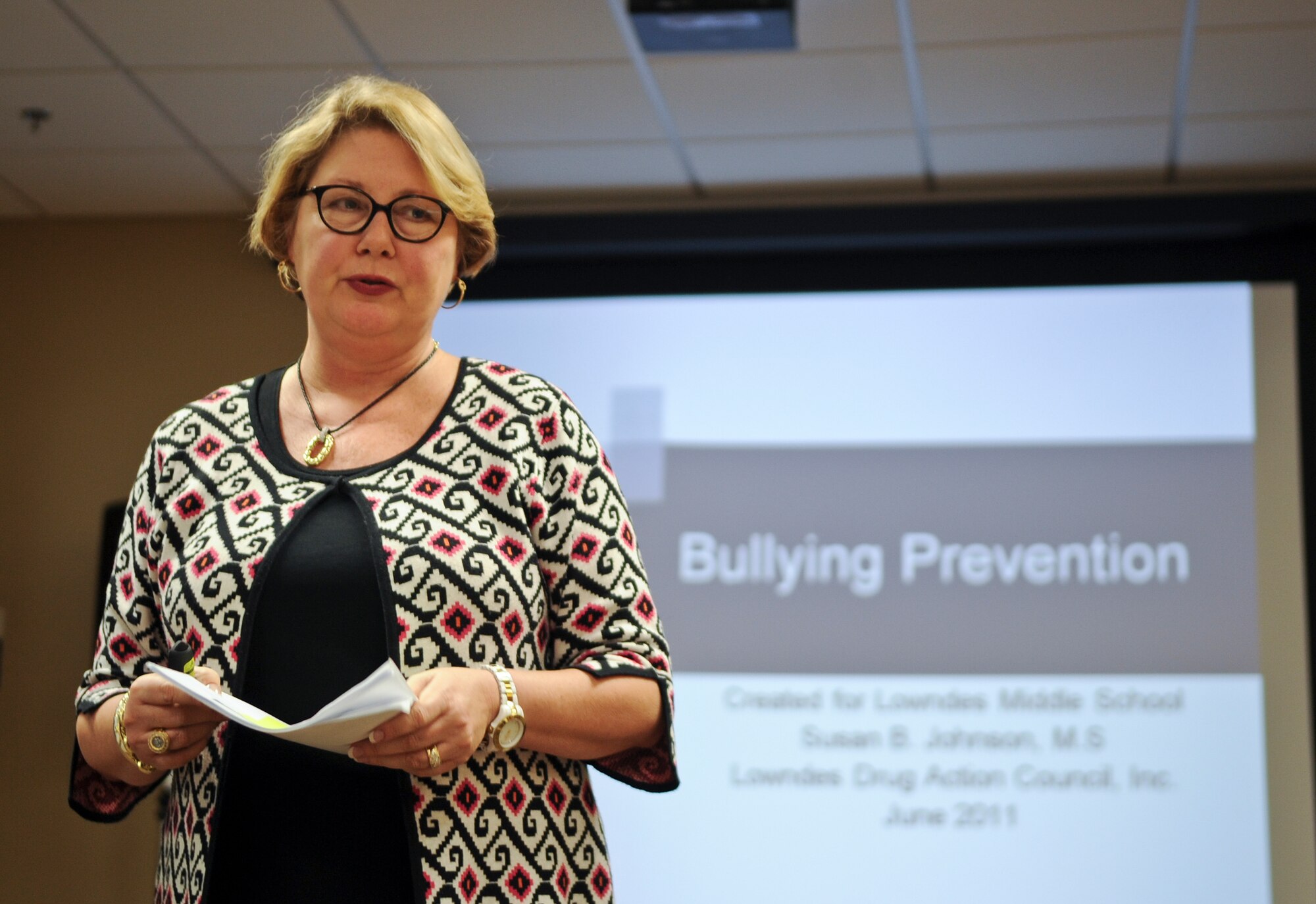Susan B. Johnson, director of Program Development for Lowndes Drug Action Council, presents an overview of bullying during an anti-bullying luncheon at Moody Air Force Base, Ga., Jan. 25, 2012. Bullying has become more prevalent due to the use of electronic technology including cell phones and social media. (U.S. Air Force photo by Airman 1st Class Olivia Dominique/Released)