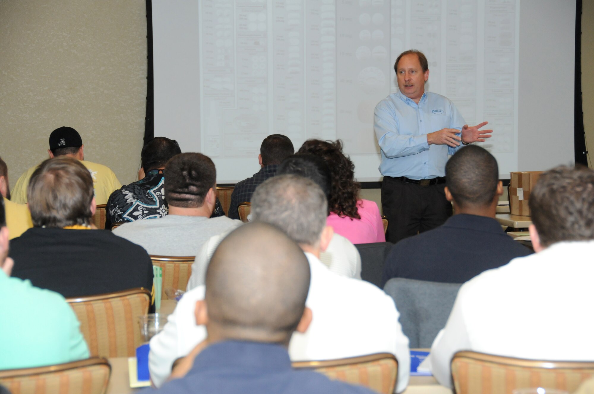 Ed Cartwright, Purdue Pharma corporate security law enforcement liaison and education director, gives a briefing during a two-day pharmaceutical drug diversion training Jan. 25, 2012, at the Bay Breeze Event Center, Keesler Air Force Base, Miss.  In attendance were representatives from 81st Security Forces Squadron and Biloxi Police Department.  (U.S. Air Force photo by Kemberly Groue)