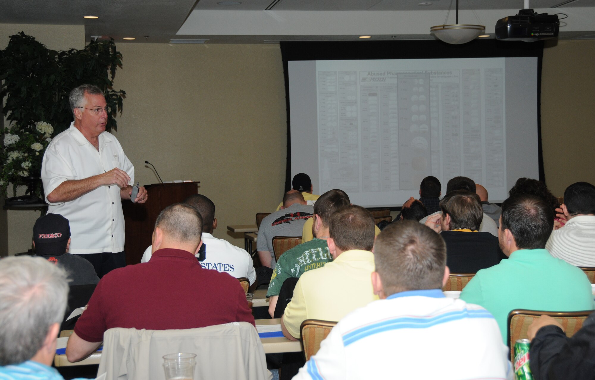 Landon Gibbs, Purdue Pharma corporate security law enforcement liaison and education director, gives a briefing during a two-day pharmaceutical drug diversion training Jan. 25, 2012, at the Bay Breeze Event Center, Keesler Air Force Base, Miss.  In attendance were representatives from 81st Security Forces Squadron and Biloxi Police Department.  (U.S. Air Force photo by Kemberly Groue)