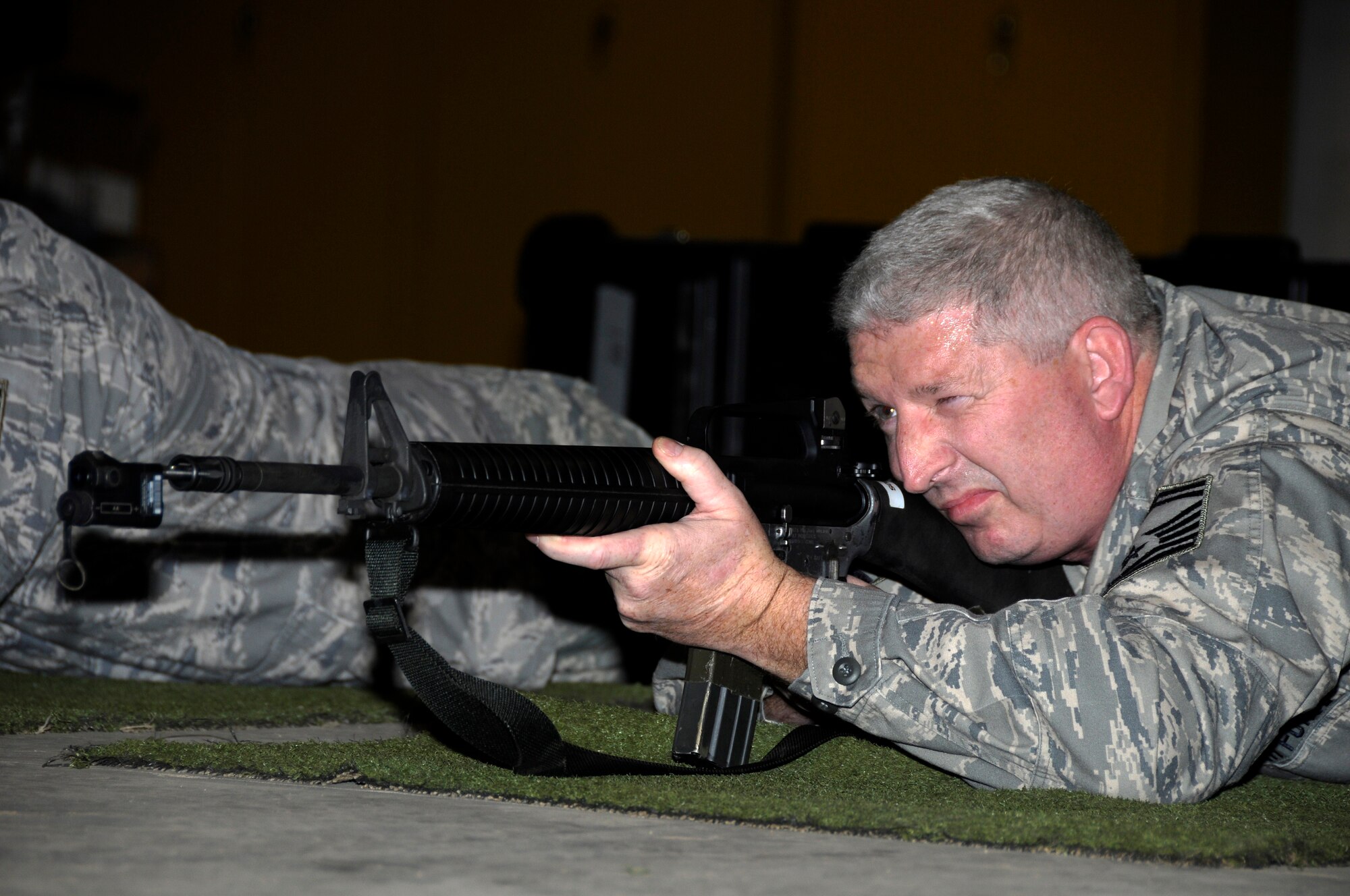 A shooter competes in Phase 1 of the Chief, National Guard Bureau Postal Match using the Laser Marksmanship Training System at the 188th Fighter Wing Jan. 8. (National Guard photo by Airman 1st Class Hannah Landeros/188th Public Affairs)