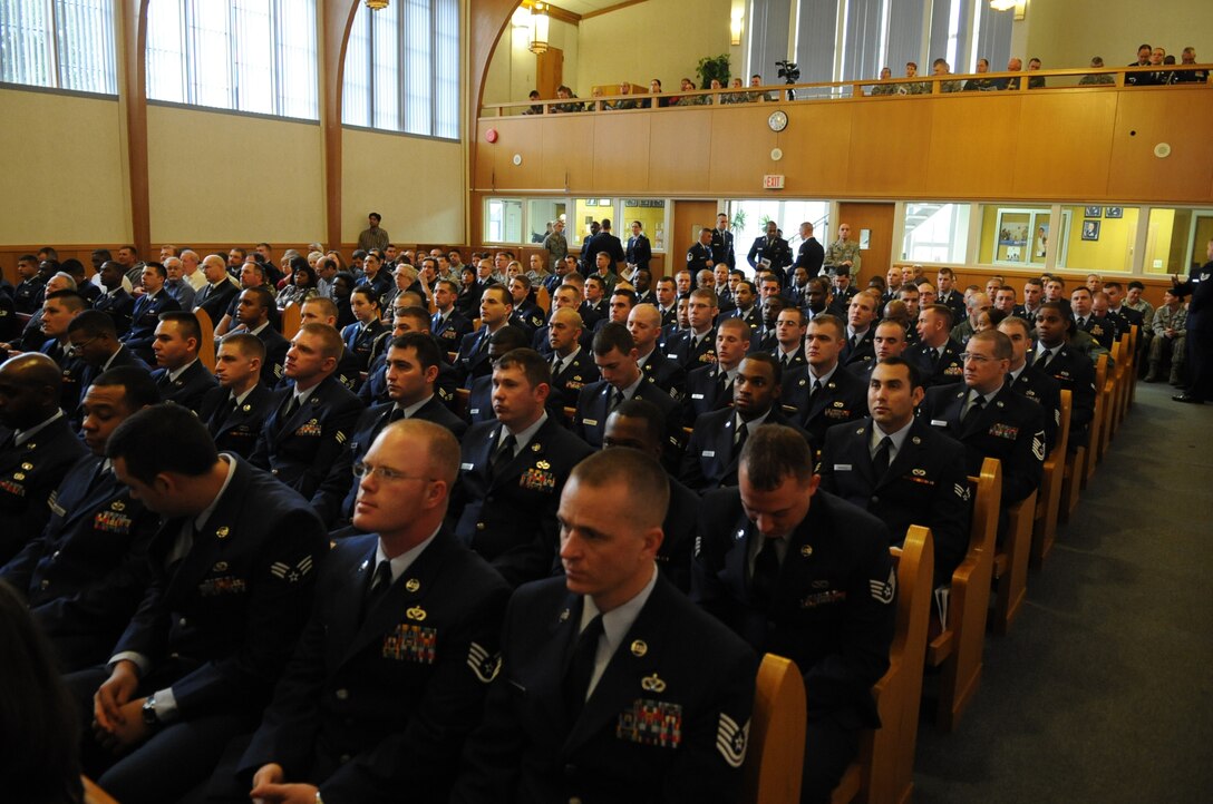 Airmen, family and friends gather to honor and remember Senior Airman Bryan Bell, 2nd Civil Engineer Squadron Explosive Ordnance Disposal technician, during his memorial service at Chapel 2 on Barksdale Air Force Base, La., Jan. 20. Bell was mortally wounded while deployed in support of Operation Enduring Freedom in Afghanistan.(U.S. Air Force photo/Airman 1st Class Micaiah Anthony)(RELEASED)