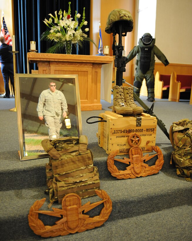 A memorial display for Senior Airman Bryan Bell, 2nd Civil Engineer Squadron Explosive Ordnance Disposal technician, sits on display at Chapel 2 on Barksdale Air Force Base, La., Jan. 20. Bell was mortally wounded while deployed in support of Operation Enduring Freedom in Afghanistan.(U.S. Air Force photo/Airman 1st Class Micaiah Anthony)(RELEASED)
