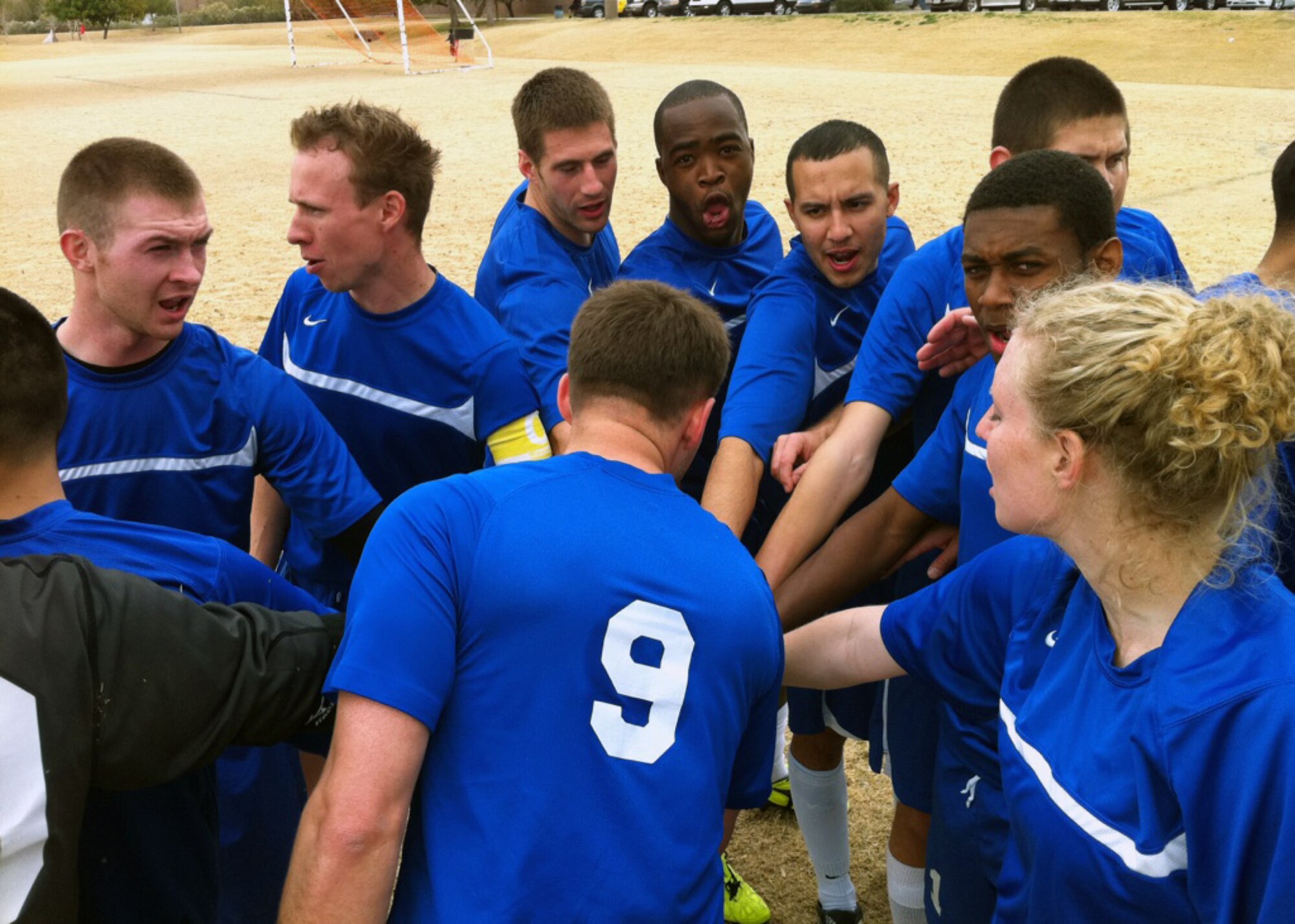 TEMPE, Ariz. -- Members of the Holloman Varsity Soccer team huddle prior to their match with the German Sundowners Jan. 15, at the Copper Cup Tournament. The Raptors defeated the Sundowners 4-1 and advanced to the tournament finals where they defeated the Arizona-based Flagstaff Ravens 2-0 for Holloman’s first soccer championship. (Courtesy Photo)