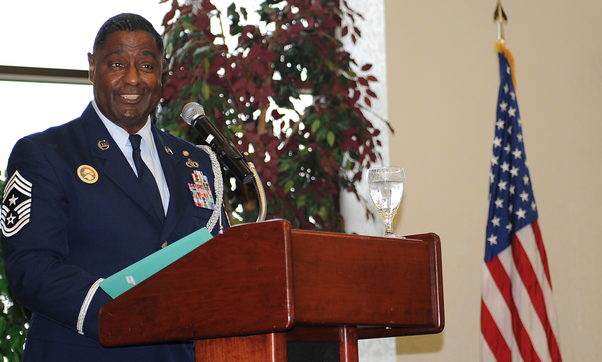 Chief Master Sgt. (retired) Bobby Dandridge, speaks to Team Scott during a Martin Luther King Jr. luncheon Jan. 20, 2012 at Scott Air Force Base, Ill.  Dandridge spoke on this year's theme "Building the Dream, Bridging the Gap." Dandridge retired from the Air Force as the first command chief master sergeant to nine installations in the United Kingdom and Norway. (U.S. Air Force photo/Airman 1st Class Divine Cox)