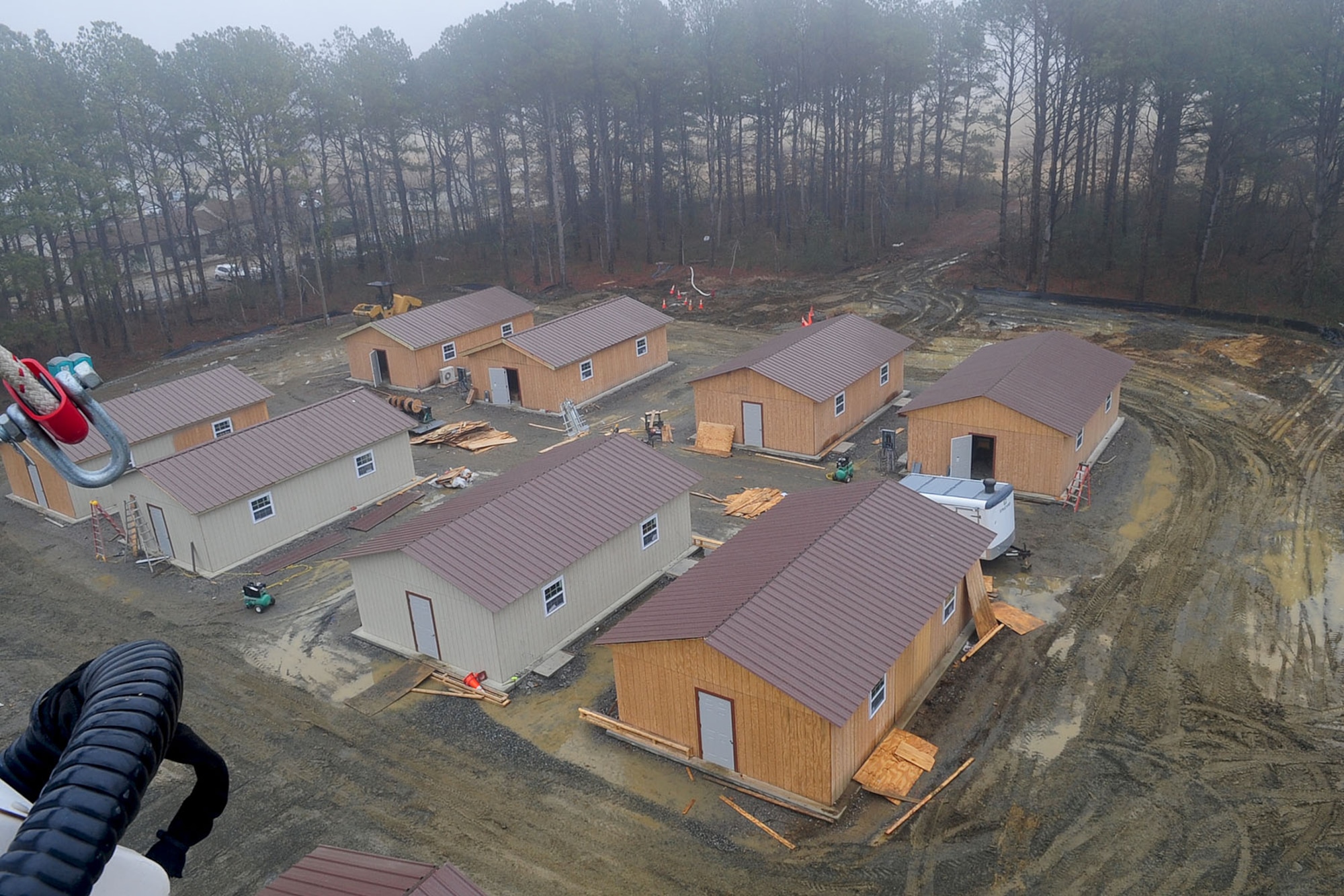 Buildings await completion at the Raptor Town construction site at Langley Air Force Base, Va., Jan., 23, 2012. The old raptor town was demolished, and the new training site is being rebuilt to provide a permanent area that accurately resembles a deployed location. (U.S. Air Force photo by Staff Sgt. Ashley Hawkins/Released)