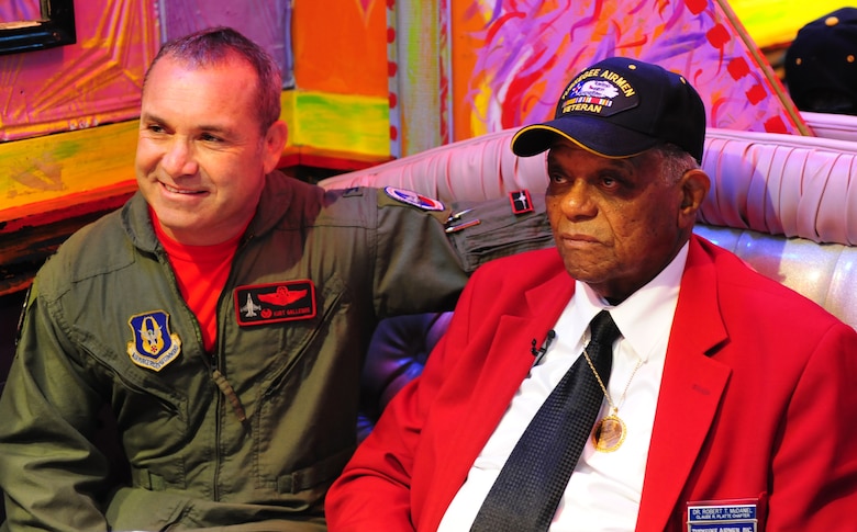 Tuskegee Airman Dr. Robert T. McDaniel, 88, poses with Col. Kurt Gallegos, 301st Operations Group commander, during a celebration of the opening of "Red Tails." The movie is based on the first all-black squadron of bombers, pilots and maintainers in the Armed Forces during World War II. Gallegos has served in three of the four units associated with the Tuskegee Airmen. (U.S. Air Force photo/Senior Airman Martha Whipple)