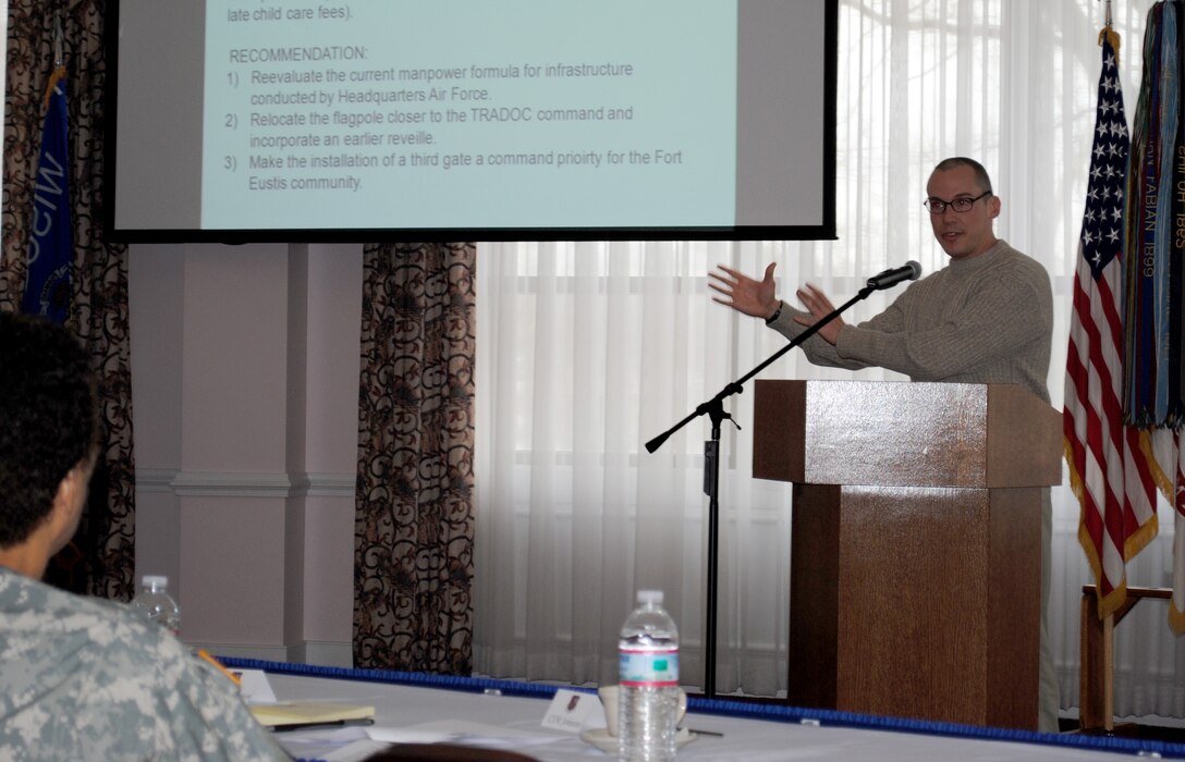Ross Montfort, Army Family Action Plan conference delegate, presents his group's two issues and their recommendations to a top-brass panel at Fort Eustis Jan. 19. Army senior leadership from the installation came together with delegates to help solve issues facing today’s Army families. (U.S. Army photo by Toni Guagenti/Released)