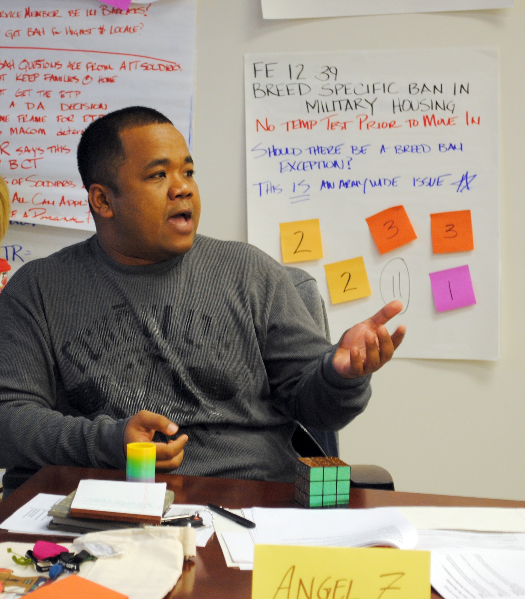 Angel Zenon, Group 1 delegate, discusses one of the many issues addressed during the Army Family Action Plan conference Jan. 18. The three-day conference at Fort Eustis was held to solve many of the problems facing today’s Army families. (U.S. Army photo by Toni Guagenti/Released)