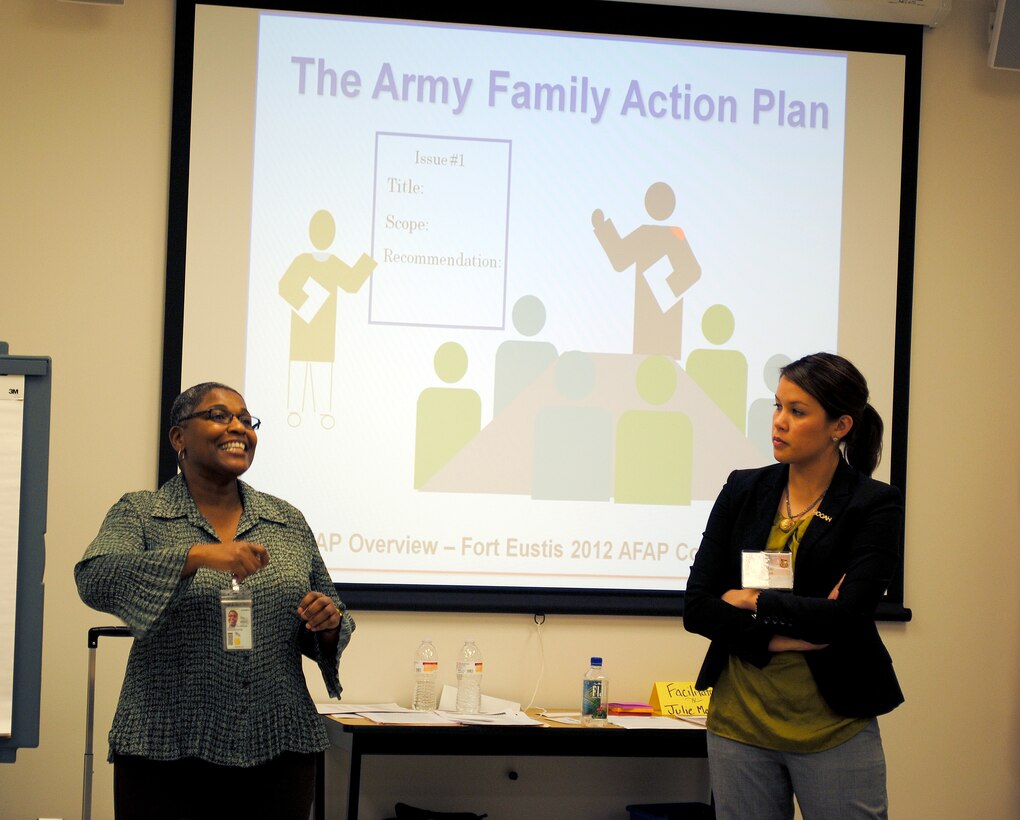 Marlene Foster Cherrye (left), Exceptional Family Member Program manager, talks to Group 1 as a subject matter expert on the Army Family Action Plan Jan. 18. Julie Machak (right) acted as the group facilitator during the three-day conference at Fort Eustis. (U.S. Army photo by Toni Guagenti/Released)