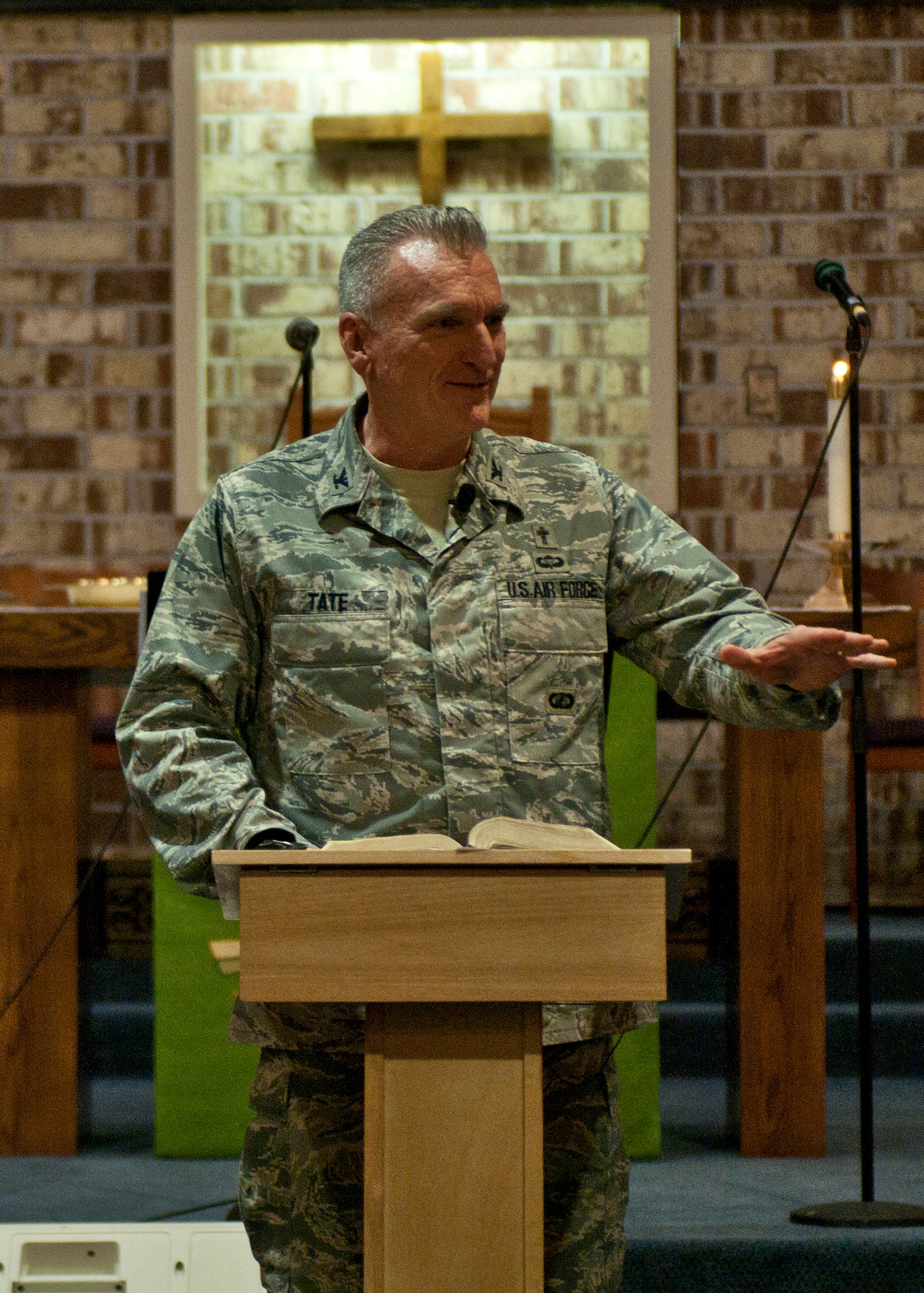 U.S. Air Force Col. Gregory Tate, Air Combat Command chaplain, preaches during a Sunday afternoon Gospel service at the Moody Air Force Base, Ga., chapel Jan. 22, 2012. Tate also attended a breakfast with the Protestant community after speaking during a Contemporary service. He preached after Chaplain (Maj.) Ismael Rodriguez, 23d Wing, began the service. (U.S. Air Force photo by Senior Airman Eileen Meier/Released)