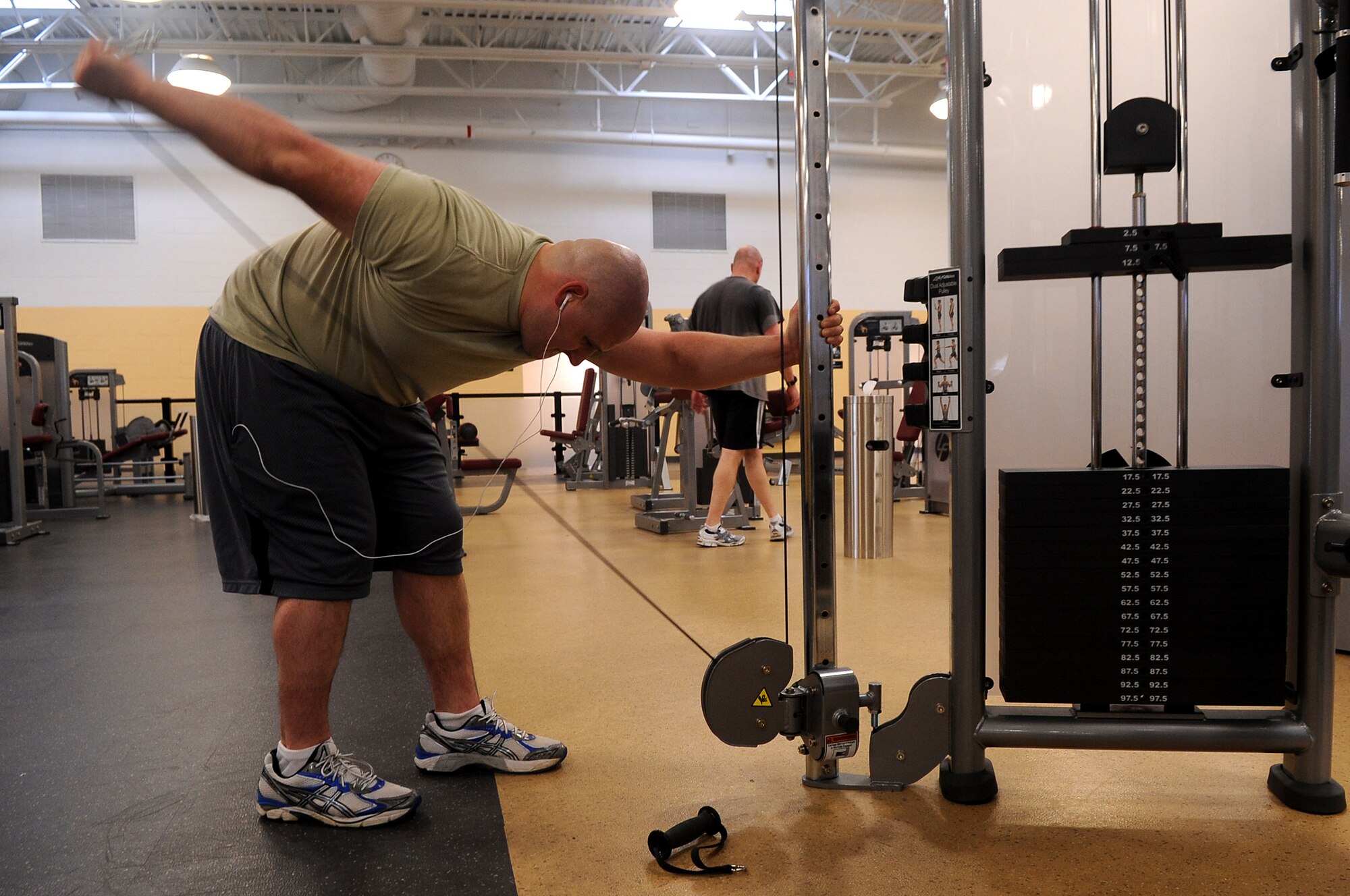U.S. Air Force Tech. Sgt. Kevin Cintron, 20th Security Forces Squadron flight sergeant, works on his triceps at the fitness center, Shaw Air Force Base, S.C., Jan. 24, 2012. Shaw Airmen use the fitness center daily to keep up their physical fitness ensuring they are prepared for deployment. (U.S. Air Force photo by Airman First Class Hunter Brady/Released)