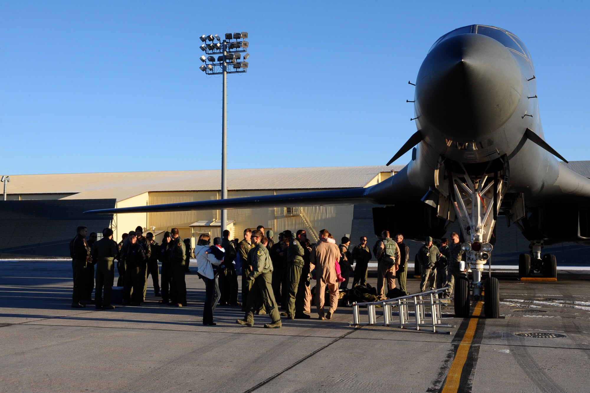 Base aircrews return to Ellsworth Air Force Base, S.D., from a six-month deployment to Southwest Asia, Jan. 17, 2012. Family members were invited out to the flightline to welcome their loved ones home. (U.S. Air Force photo by Airman 1st Class Zachary Hada/Released)