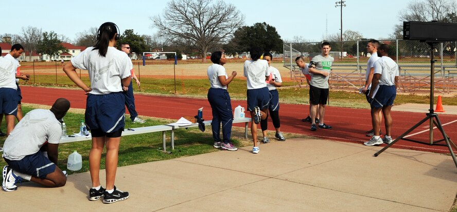 Airmen prepare for the 1.5 mile run during a physical training test on Barkdsdale Air Force Base, La., Jan. 24. Airmen take a Fitness Assessment test twice a year unless they score 90 points or above qualifying them for once a year. (U.S. Air Force photo/Airman 1st Class Andrew Moua)(RELEASED)