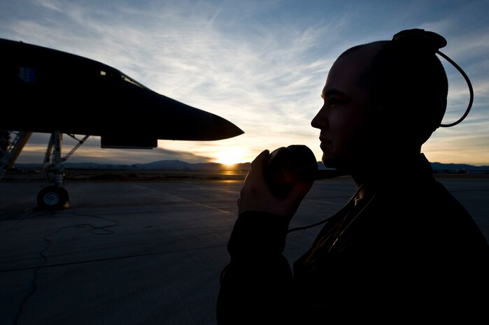 U.S. Air Force Airman 1st Class Brandon Wilkins, 28th Aircraft Maintenance Squadron crew chief, Ellsworth Air Force Base, S.D., oversees a pre-flight check of a B-1B Lancer during Red Flag 12-2 Jan. 24, 2012, at Nellis Air Force Base, Nev. Red Flag is a realistic combat training exercise involving the air forces of the United States and its allies. The exercise is hosted north of Las Vegas on the Nevada Test and Training Range. (U.S. Air Force photo by Senior Airman Brett Clashman)
