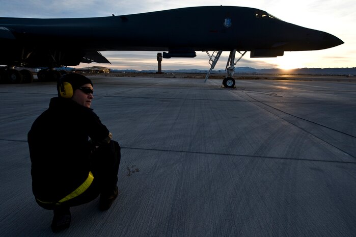 U.S. Air Force Airman 1st Class Neal Larson, 28th Aircraft Maintenance Squadron crew chief, Ellsworth Air Force Base, S.D., oversees a pre-flight check of a B-1B Lancer during Red Flag 12-2 Jan. 24, 2012, at Nellis AFB, Nev. Red Flag is a realistic combat training exercise involving the air forces of the United States and its allies. The exercise is hosted north of Las Vegas on the Nevada Test and Training Range. (U.S. Air Force photo by Senior Airman Brett Clashman)