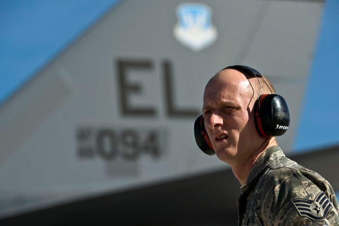 U.S. Air Force Staff Sgt. Joshua Simmons, 28th Aircraft Maintenance Squadron aircraft electrical and environmental journeyman, Ellsworth Air Force Base, S.D., waits for a B-1B Lancer to depart for a training mission during Red Flag 12-2 Jan. 24, 2011, at Nellis Air Force Base, Nev. Red Flag is a realistic combat training exercise involving the air forces of the United States and its allies. The exercise is hosted north of Las Vegas on the Nevada Test and Training Range. (U.S. Air Force photo by Senior Airman Brett Clashman)