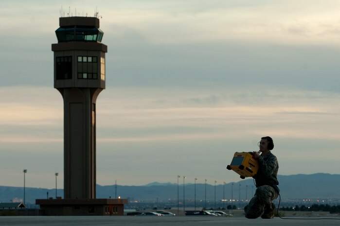 A U.S. Air Force Airman from the 28th Aircraft Maintenance Squadron, Ellsworth Air Force Base, S.D., conducts a pre-flight inspection for a B-1B Lancer during Red Flag 12-2 Jan. 24, 2012, at Nellis AFB, Nev. Red Flag is a realistic combat training exercise involving the air forces of the United States and its allies. The exercise is hosted north of Las Vegas on the Nevada Test and Training Range. (U.S. Air Force photo by Staff Sgt. Christopher Hubenthal)