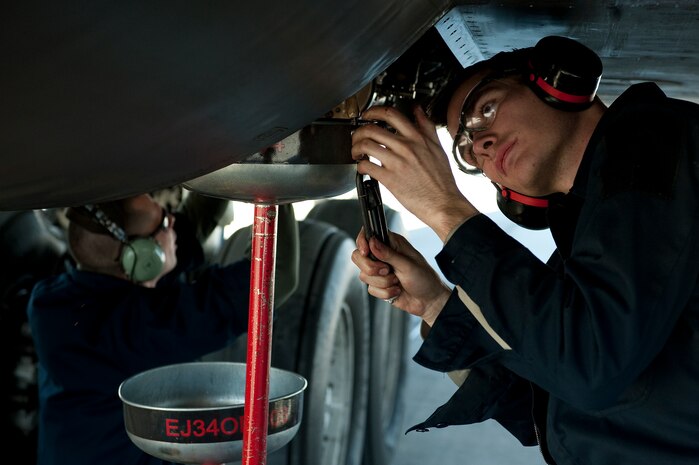 U.S. Air Force Airman 1st Class Justin Hildreth, 28th Aircraft Maintenance Squadron aerospace propulsion journeyman, provides pre-flight maintenance for a B-1B Lancer, Ellsworth Air Force Base, S.D., during Red Flag 12-2 Jan. 24, 2012, at Nellis Air Force Base, Nev. Red Flag is a realistic combat training exercise involving the air forces of the United States and its allies. The exercise is hosted north of Las Vegas on the Nevada Test and Training Range. (U.S. Air Force photo by Staff Sgt. Christopher Hubenthal)