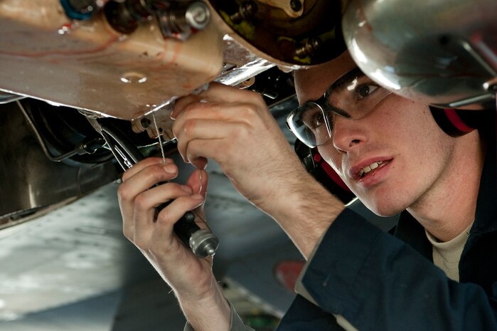 U.S. Air Force Airman 1st Class Justin Hildreth, 28th Aircraft Maintenance Squadron aerospace propulsion journeyman, provides pre-flight maintenance for a B-1B Lancer, Ellsworth Air Force Base, S.D., during Red Flag 12-2 Jan. 24, 2012, at Nellis AFB, Nev. Red Flag is a realistic combat training exercise involving the air forces of the United States and its allies. The exercise is hosted north of Las Vegas on the Nevada Test and Training Range. (U.S. Air Force photo by Staff Sgt. Christopher Hubenthal)
