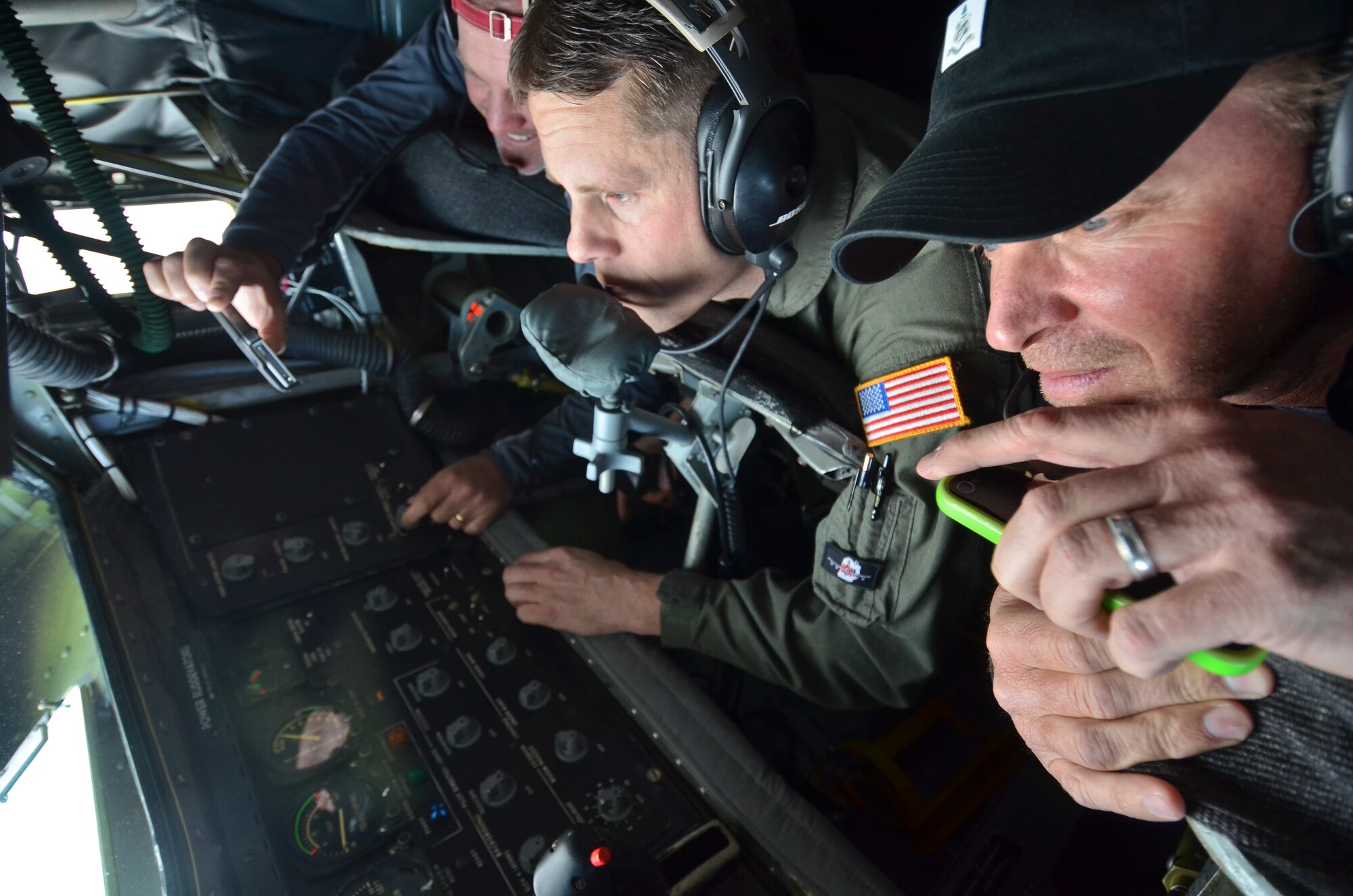 Professional Golfers Association (PGA) golfers, Steve Stricker (right) and Jerry Kelly (left) observe an air refueling mission from the boom pod of a KC-135R Tanker performed by boom operator MSgt Pete Gauerke January 25, 2012. The two golfers, who hail from Wisconsin, were invited to the 128th Air Refueling Wing, Milwaukee Wisconsin for an orientation flight on a KC-135R tanker and tour of the Wing’s facilities. (U.S. Air Force Photo by: SMSgt Jeffrey A. Rohloff) (Released)
