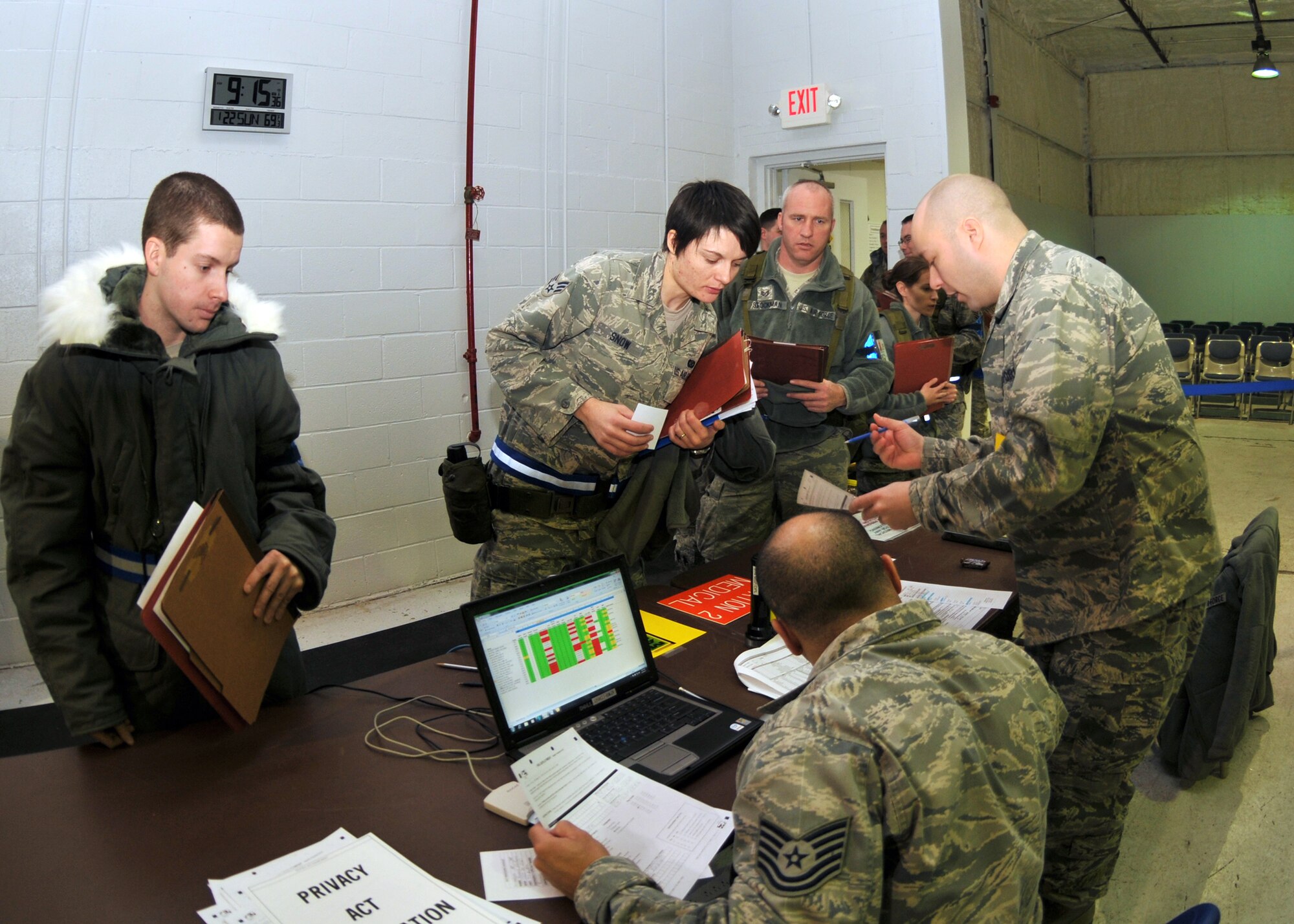 Members of the 914th and 107th Airlift Wings “Team Niagara” prepare for their upcoming Operational Readiness Inspection during a joint unit training assembly January 21, 2012, Niagara Falls Air Reserve Station, NY. During the exercise Team Niagara members go through all the steps of a deployment line. (U.S. Air Force photo by Tech. Sgt. Joseph McKee) 