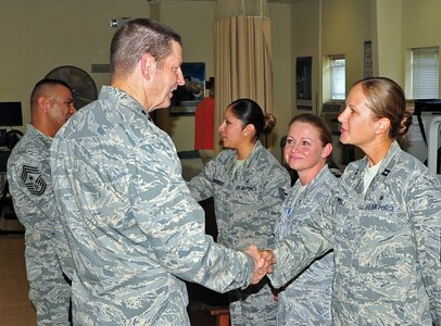 SOTO CANO AB, Honduras – Lt. Gen. Robin Rand, Commander, 12th Air Force and Commander, Air Forces Southern,  and 12th AF Command Chief Master Sgt. Gerardo Tapia Jr., meet with members of Joint Task Force-Bravo’s Medical Element Surgical Team during their visit Jan. 24 here. This was Rand’s first visit to the installation since he took command last month. (Air Force photo/Staff Sgt. Bryan Franks)