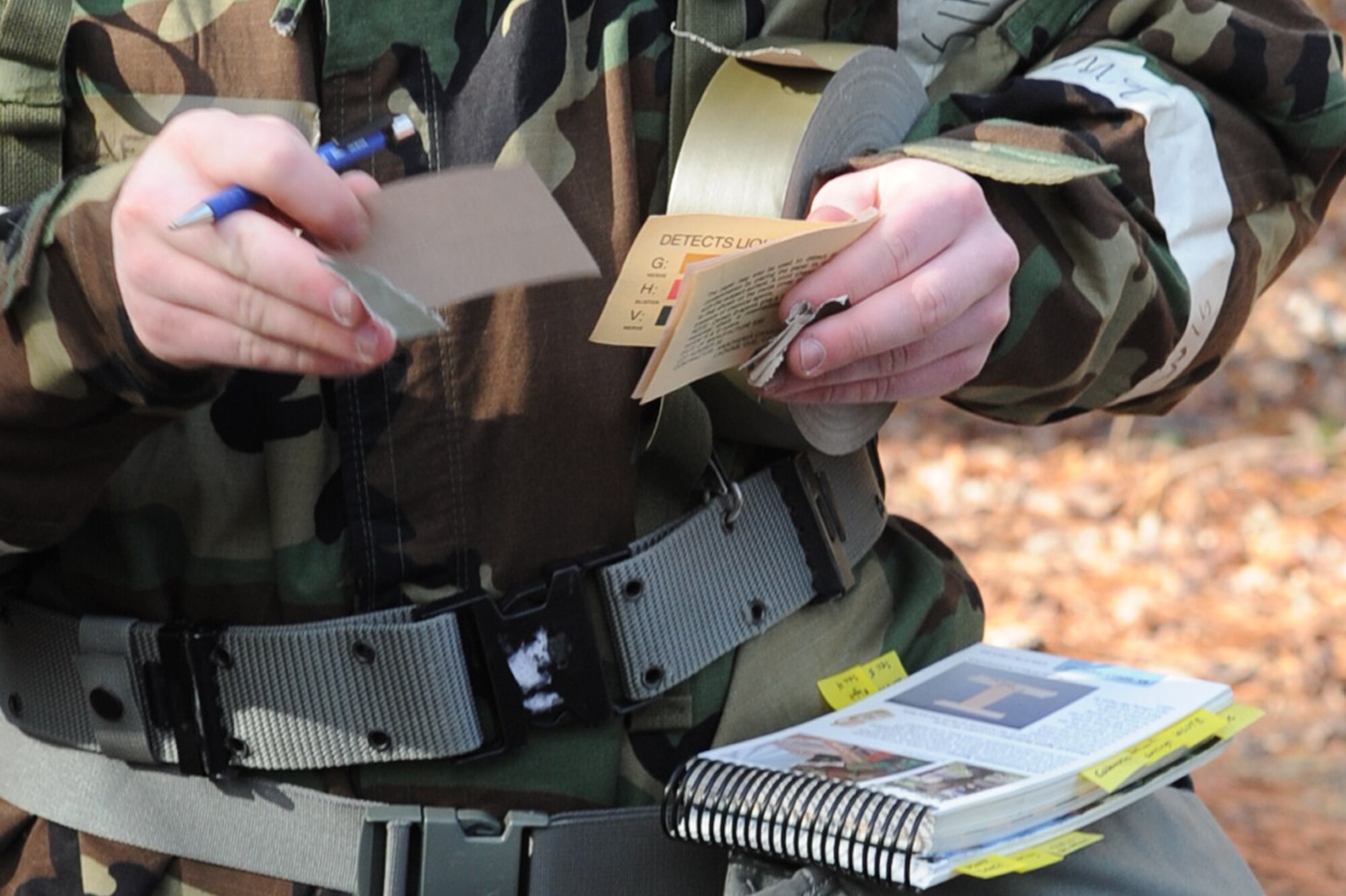 Airman 1st Class Corey Antos prepares to write on M-8 paper during Ability to Survive and Operate Rodeo training on Seymour Johnson Air Force Base, N.C., Jan. 25, 2012. Airmen use M-8 paper to perform a test that detects chemical agents in a suspected contaminated area. Antos is a 4th Operation Support Squadron aircrew flight equipment journeyman from Chicago. (U.S. Air Force photo/Senior Airman Whitney Stanfield)  