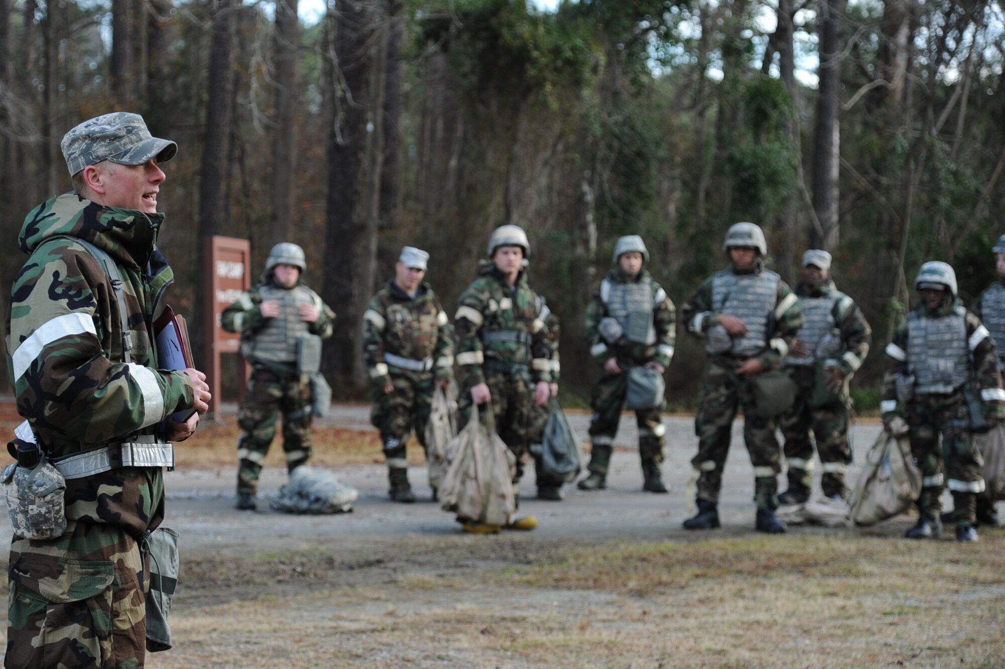 Master Sgt. Michael English briefs Airmen on what to expect during Ability to Survive and Operate Rodeo training on Seymour Johnson Air Force Base, N.C., Jan. 25, 2012. The training raises awareness and tests response measures to chemical, biological, radiological and nuclear attacks. English is a 4th Civil Engineer Squadron readiness and emergency management craftsman from Washington, Ga. (U.S. Air Force photo/Senior Airman Whitney Stanfield)  