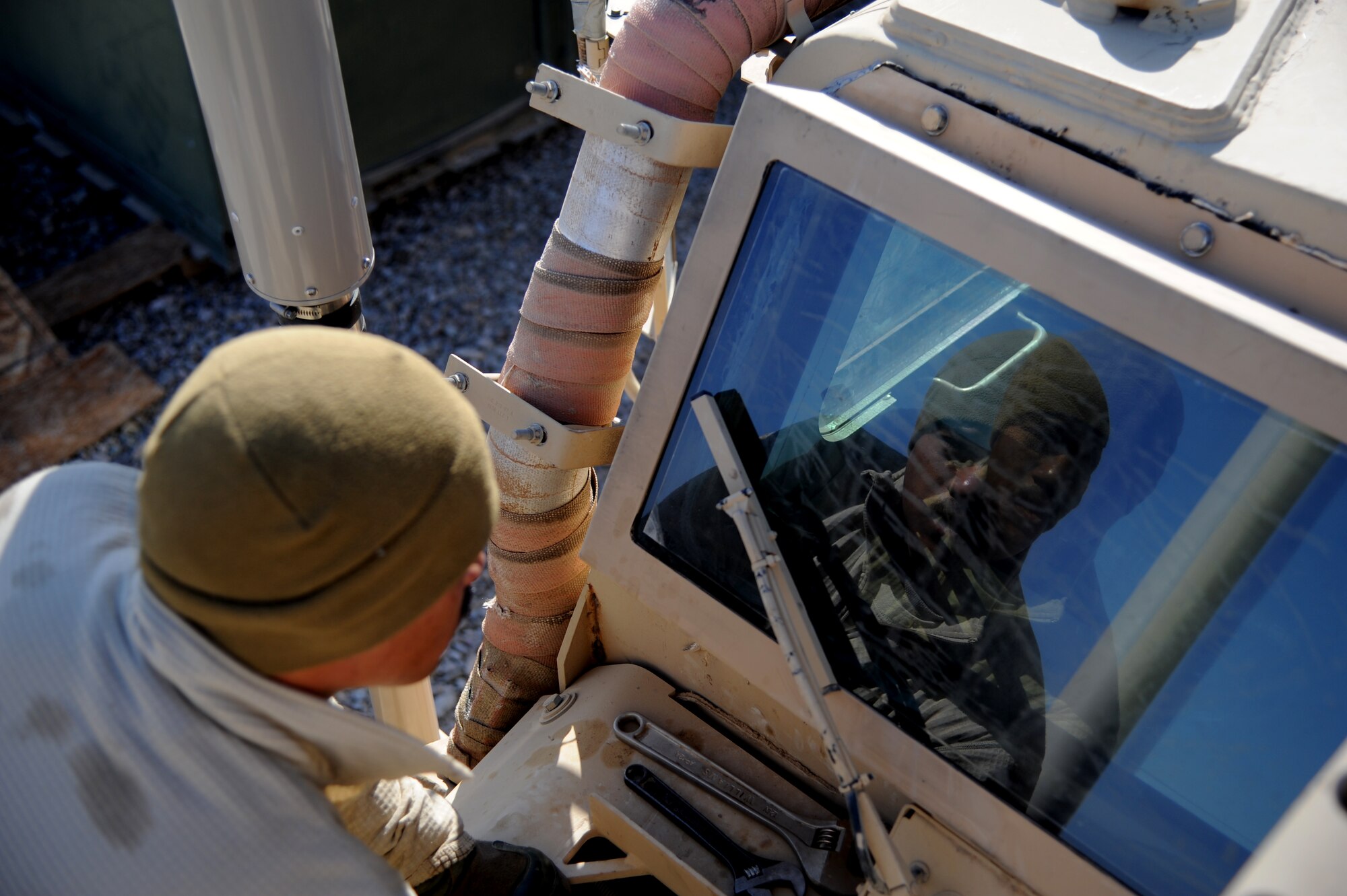 MAIN OPERATING BASE LEATHERNECK, Afghanistan -- Tech. Sgt. Jason Lubas, a vehicle mechanic assigned to the 466th Explosive Ordnance Disposal Flight, Operating Location-Delta, works on a Mine Resistant Ambush Protected vehicle. Lubas's mission is to maintain the 26 MRAP vehicles that keep the OL-D EOD technicians on the road. He is deployed from Dyess Air Force Base, Texas. (U.S. Air Force photo/Senior Airman Tyler Placie)