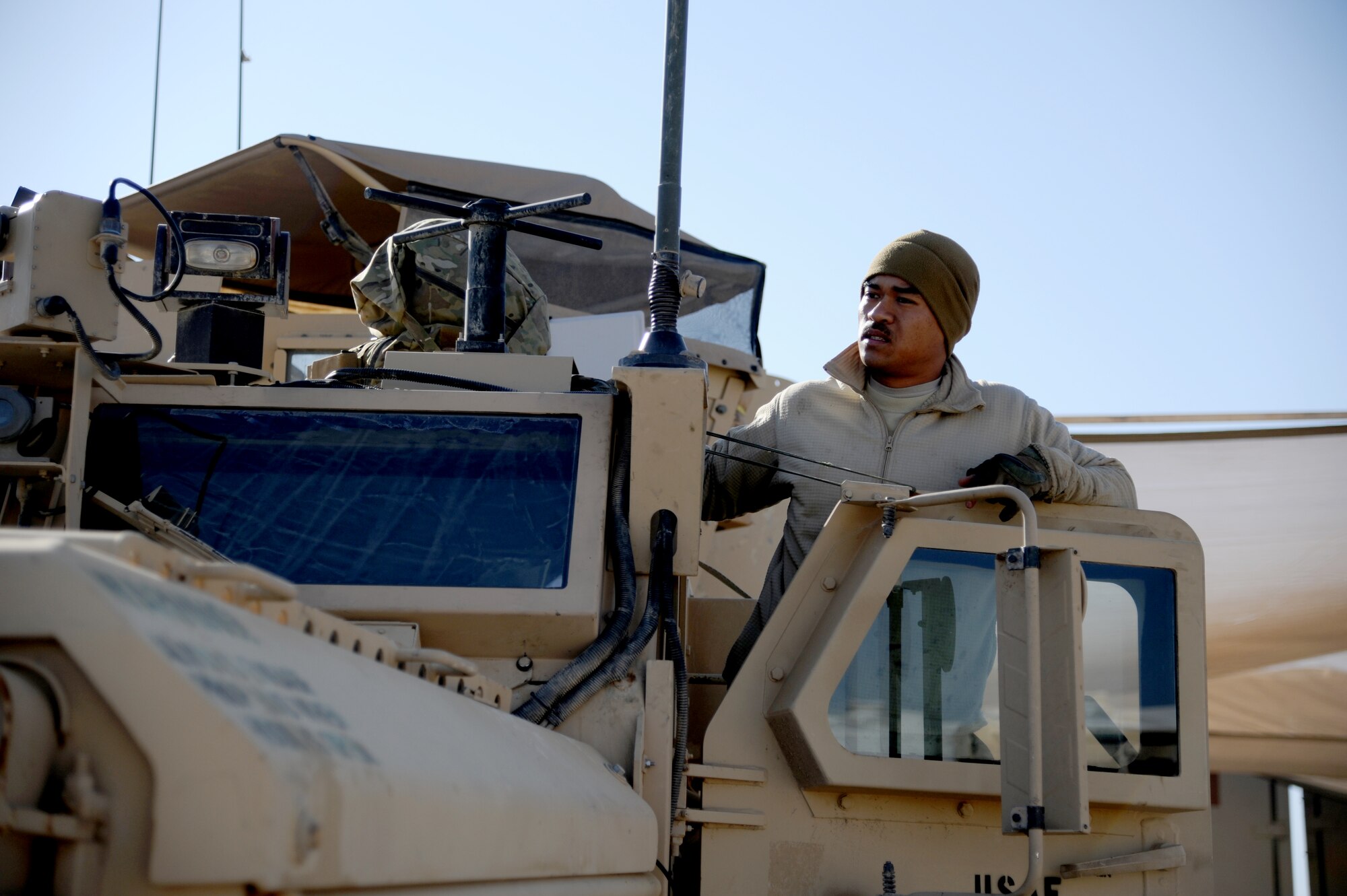 MAIN OPERATING BASE LEATHERNECK, Afghanistan -- Tech. Sgt. Jason Lubas, a vehicle mechanic assigned to the 466th Explosive Ordnance Disposal Flight, Operating Location-Delta, stands in the doorway of a Mine Resistant Ambush Protected vehicle. Lubas's mission is to maintain the 26 MRAP vehicles that keep the OL-D EOD technicians on the road. He is deployed from Dyess Air Force Base, Texas. (U.S. Air Force photo/Senior Airman Tyler Placie)