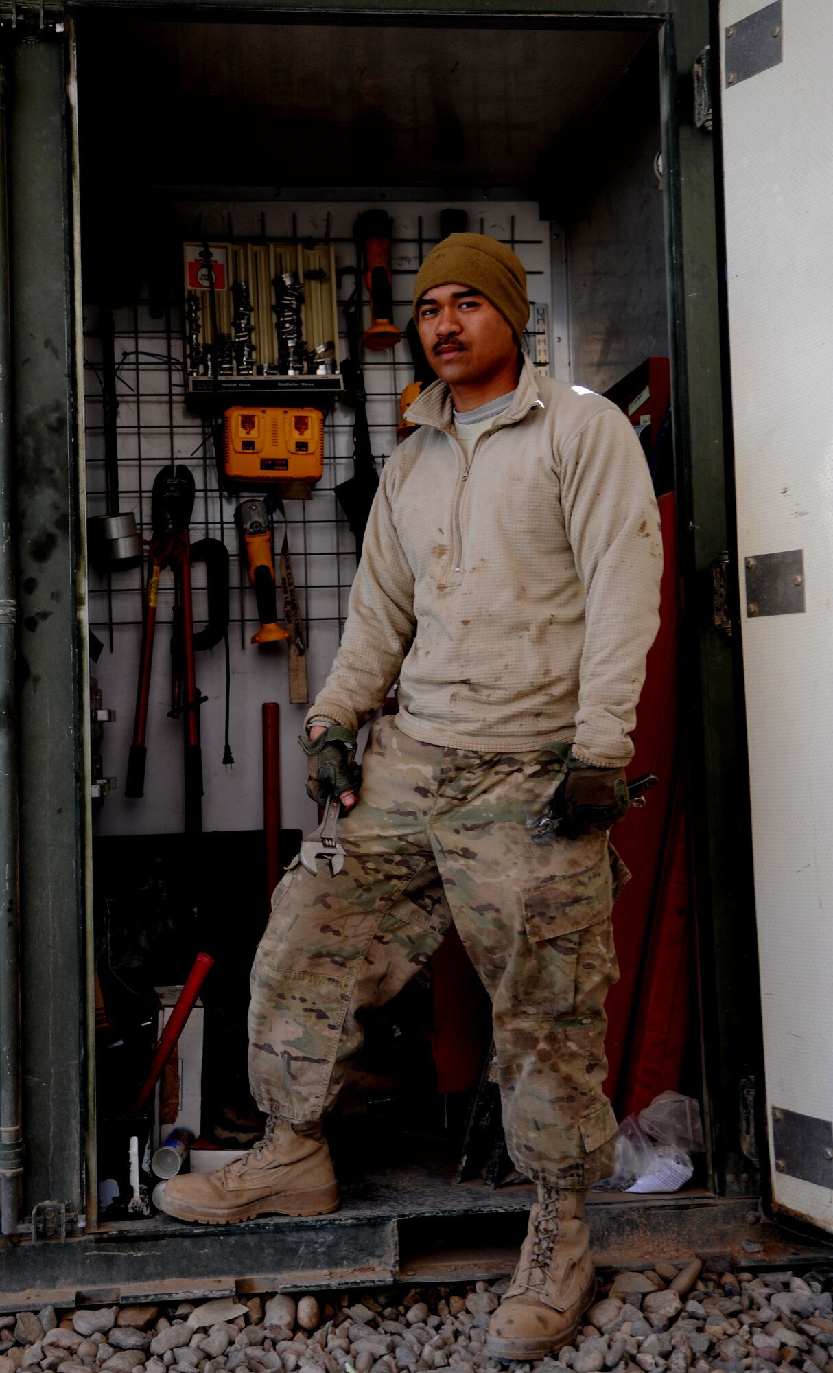 MAIN OPERATING BASE LEATHERNECK, Afghanistan -- Tech. Sgt. Jason Lubas, a vehicle mechanic assigned to the 466th Explosive Ordnance Disposal Flight, Operating Location-Delta, stands near his tools. Lubas's mission is to maintain the 26 Mine Resistant Ambush Protected vehicles that keep the OL-D EOD technicians on the road. He is deployed from Dyess Air Force Base, Texas. (U.S. Air Force photo/Senior Airman Tyler Placie)
