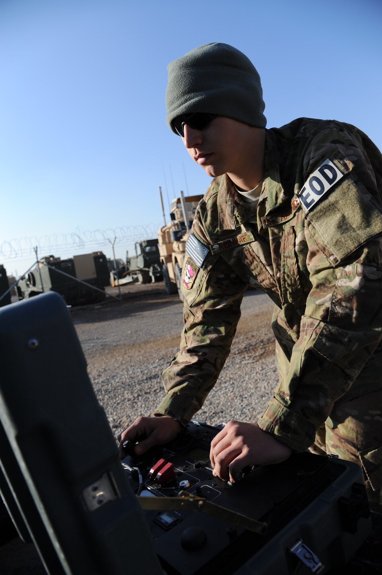 MAIN OPERATING BASE LEATHERNECK, Afghanistan -- Airman 1st Class Seth Reinhart, an Explosive Ordnance Disposal technician from the 466th EOD Flight, Operating Location-Delta, trains for a mission using a computer that controls a robot which can be used by an EOD team to get close to suspected Improvised Explosive Devices while they stay protected in an armored vehicle. The mission of the Airmen of OL-D is primarily focused on countering the IED threat, destroying enemy caches and munitions stockpiles, and responding to threats of indirect fire. (U.S. Air Force photo/Senior Airman Tyler Placie)