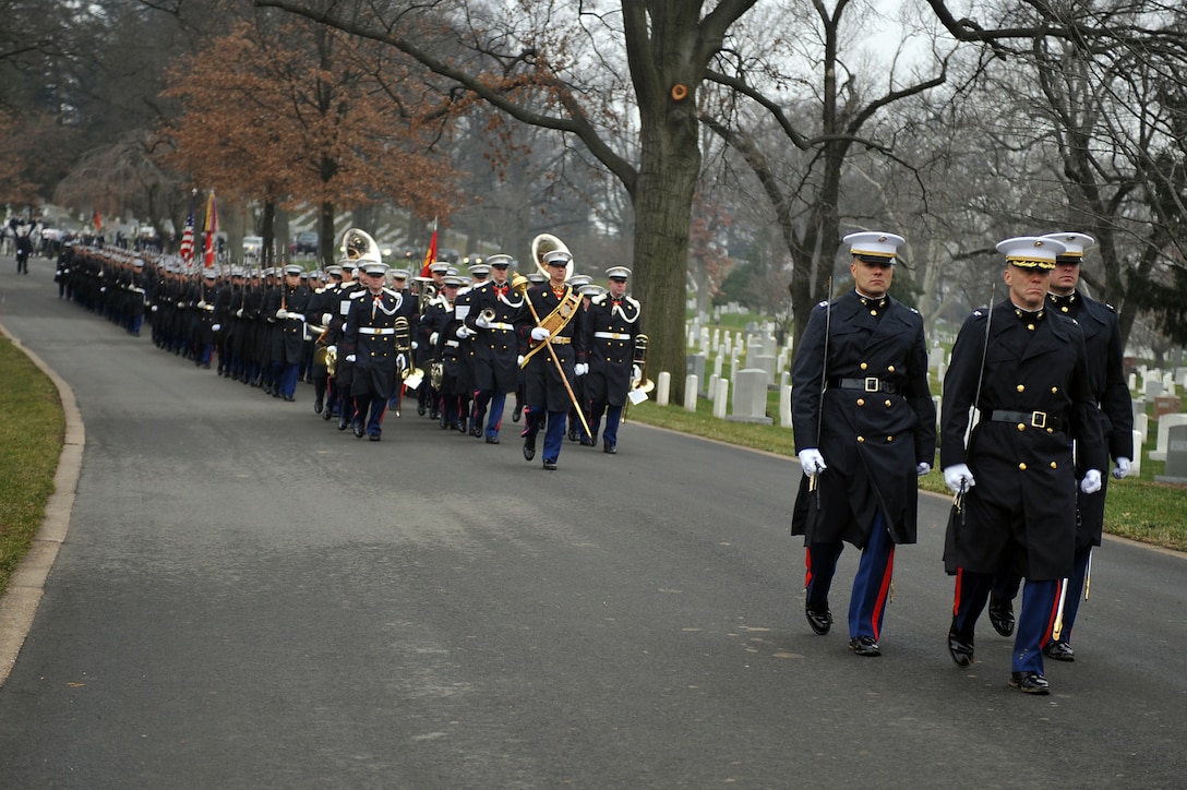 More than 130 Marines from Marine Barracks Washington escort the casket of Gen. Samuel Jaskilka (1919-2012), 16th assistant commandant of the Marine Corps, to the grave site at Arlington National Cemetery Jan. 26. Jaskilka joined the Marine Corps reserves as a second lieutenant in 1942 and served as the assistant commandant from 1975 until he retired in 1978. Jaskilka was also honored with a flyover of four MV-22 Ospreys during the ceremony. Jaskilka’s awards include the Navy Distinguished Service Medal, two Silver Star Medals, a Legion of Merit, a Bronze Star Medal with a valor device, a World War II Victory Medal, seven Vietnam Service Medals and a United Nations Korea Medal.::r::::n::