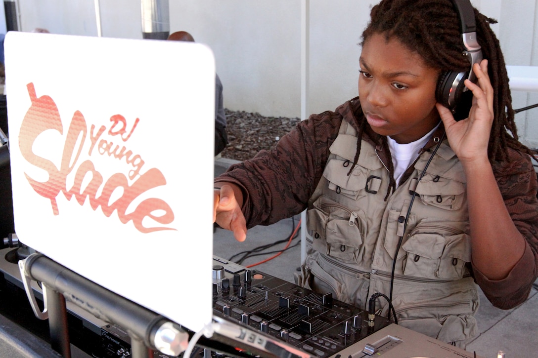 DJ Young Slade, son of mainstream crunk artist Lil Jon, spins tracks outside Marine Corps Base Camp Pendleton’s Country Store, Jan. 26. The 12-year-old disc jockey was presented by BodyArmor, "the all natural super drink." Free BodyArmor samples and a hotdog lunch was served to the first 750 customers.