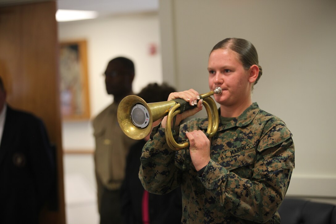 A Marine plays TAPS during Staff Sgt. Jimmie Senn’s memorial service at Camp Johnson, N.C. Jan. 27. Senn was a medium tactical vehicle replacement instructor with Marine Corps Combat Support School who passed away due to severe head trauma.