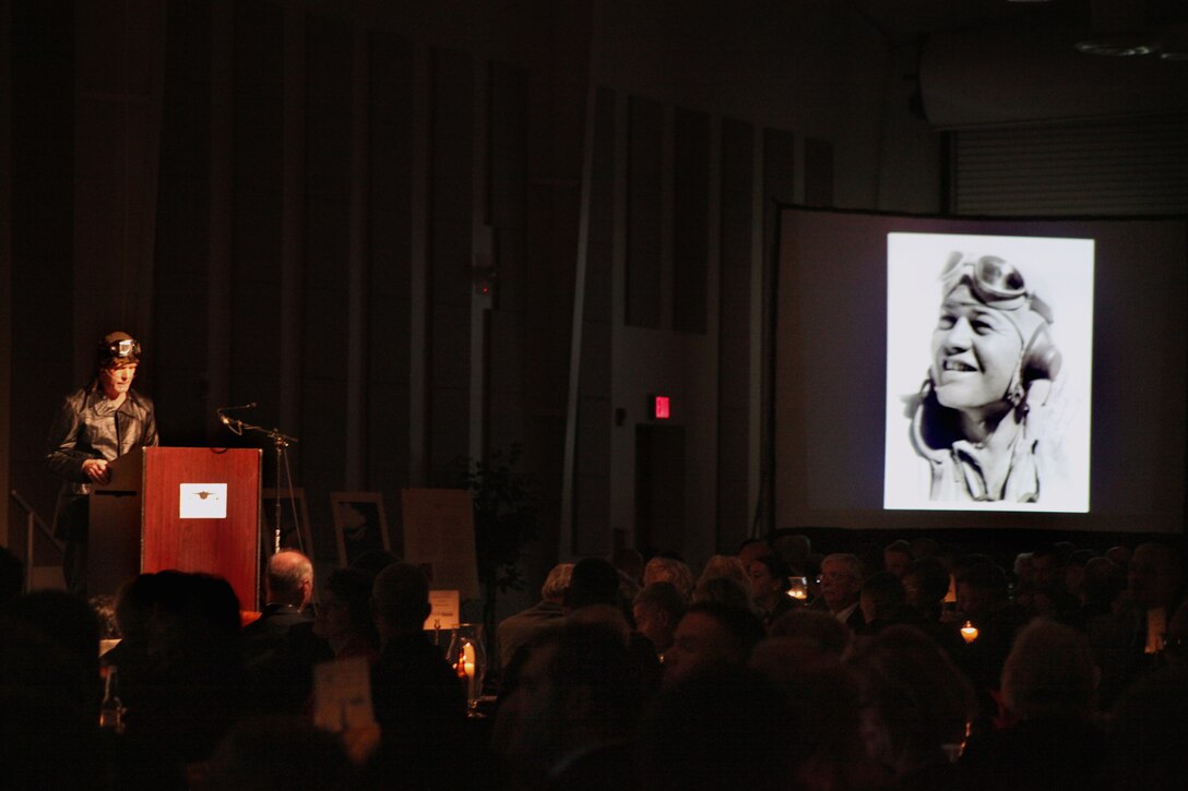 Retired Maj. Gen. Thomas A. Braaten, former commander of Marine Corps Air Bases East and commanding general of Marine Corps Air Station Cherry Point, speaks to a crowd of 500 Cherry Point and surrounding community residents during an annual aviation history gala at the Havelock Tourist and Event Center in Havelock, N.C., Jan. 27.