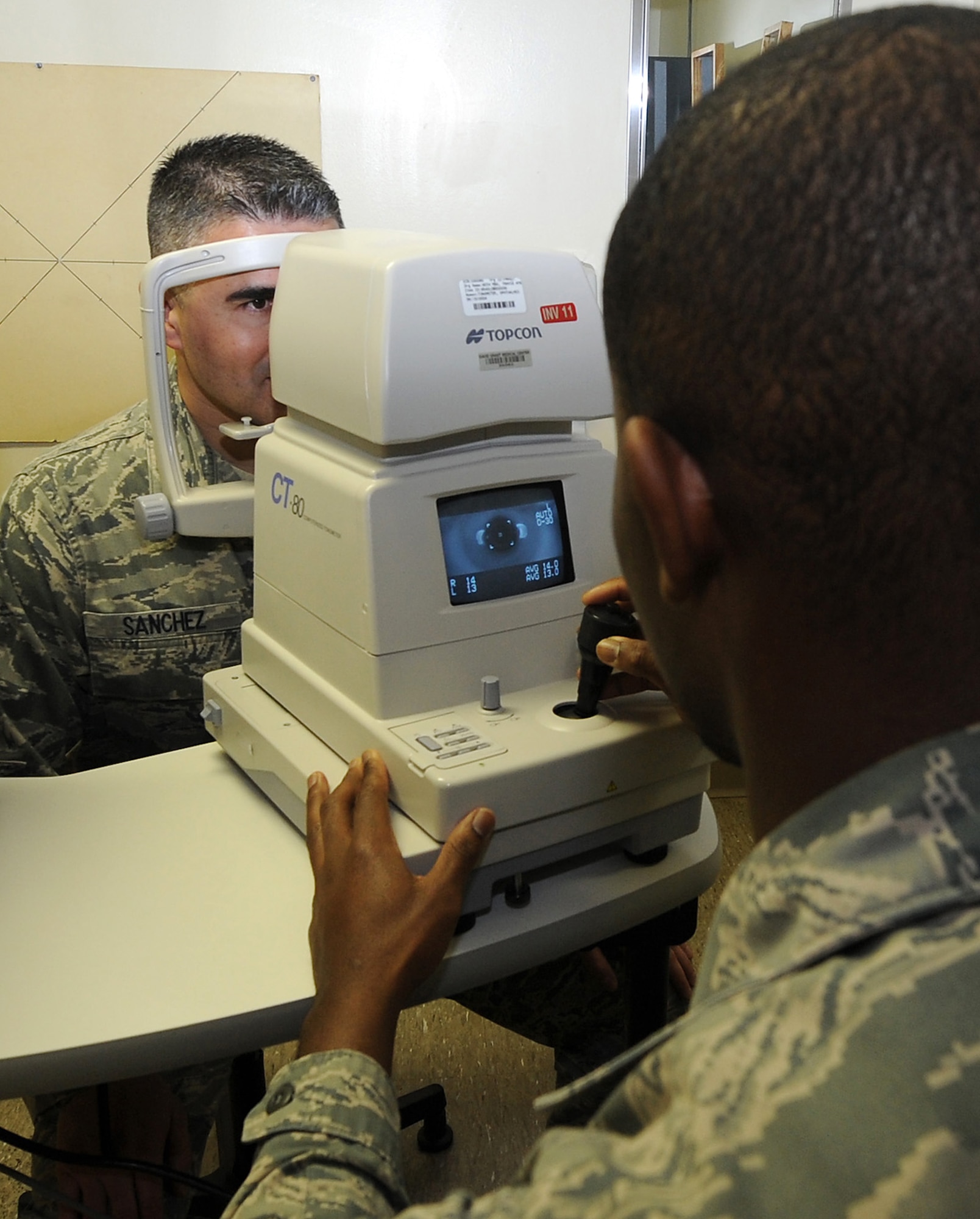 Airman 1st Class Ikeem Taylor, ophthalmic technician, performs a noncontact tonometry test Jan. 26 at the David Grant USAF Medical Center Optometry Clinic. This test is used to check for glaucoma, an eye disease that can cause blindness by damaging the nerve in the back of the eye. (U.S. Air Force photo/ Staff Sgt. Liliana Moreno)