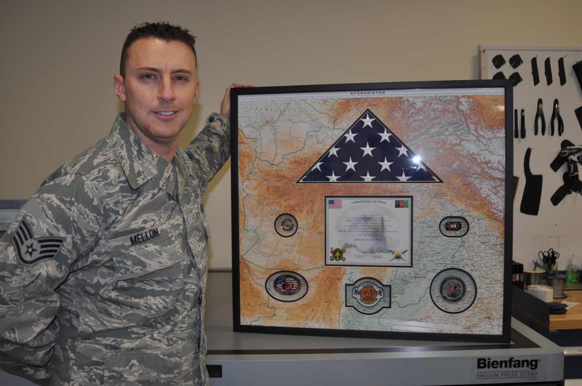 Staff Sgt. Stephen Mellon, 336th Training Support Squadron psychiatry technician, finished this shadow box for a squadron member Jan 4. He went through the framing class three years ago and has been building shadow boxes for his squadron ever since. “Since I took the class, I get about 50 percent off on materials and we don’t have to pay for labor. I’ve probably built more than 50 boxes for departing personnel saving thousands of dollars for the people in my squadron.” (U.S. Air Force photos by Scott King) 