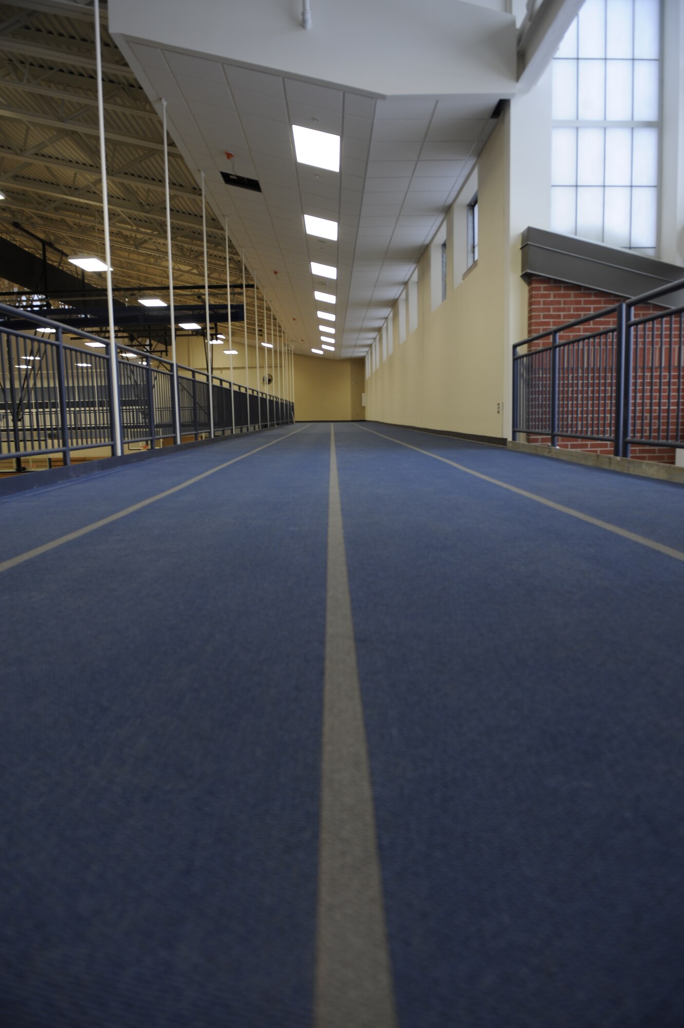 The fitness center’s new indoor 1/8th mile track stands ready for runners to use. (U.S. Air Force photos by Airman 1st Class Earlandez Young) 