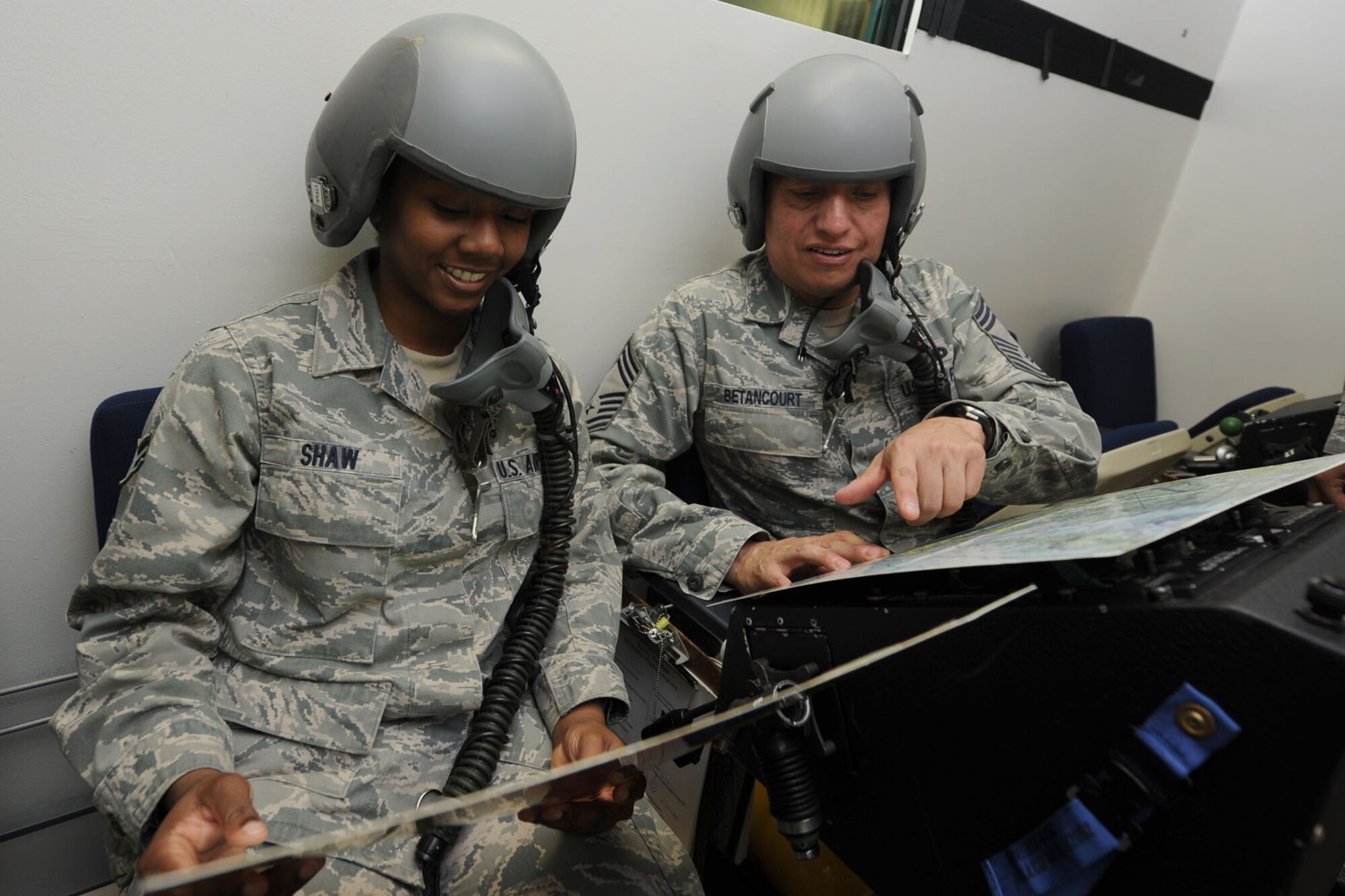 U.S. Air Force Airman 1st Class Alexis Shaw, 633rd Medical Support Squadron health services management technician, shadows Chief Master Sgt. Steve Betancourt, 633rd Medical Group superintendent, during Chief Shadow Day at Langley Air Force Base, Va., Jan. 26, 2012. Chiefs offer guidance for future career and life success to junior enlisted Airmen by presenting one-on-one mentorship opportunities during the event. (U.S. Air Force photo by Airman 1st Class Racheal Watson/Released)