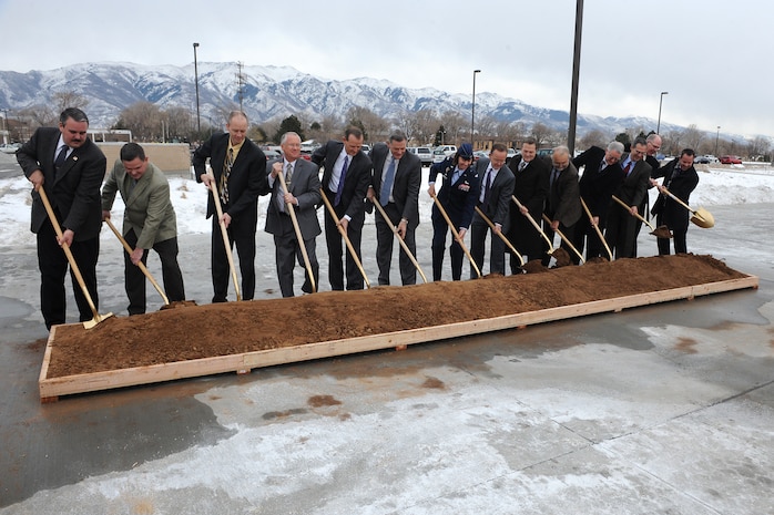 State and local leaders, along with base and Air Force leadership, use shovels to dig into soil set up for an official groundbreaking for the next building to begin construction in the Falcon Hill National Aerospace Research Park at Hill Air Force Base Jan. 18. (Left to right) They include: Rep. Lee Perry (R-Perry), Chief of Real Property Management Portfolio Air Force Real Property Agency John Busca, Falcon Hill Enhanced Use Lease Program Manager Darrin Wray, Clearfield Mayor Don Wood, Rep. Brad Dee (R-Ogden), Sen. Scott Jenkins (R-Weber), 75th Air Base Wing commander Col. Sarah Zabel, Sen. Stuart Adams (R-Weber), Sen. Jerry Stevenson (R-Davis), Woodbury Corp. vice president of Developement Jeff Woodbury, Woodbury corporate secretary and VP of Commericial Management Randy Woodbury, Hunt Senior VP Juan Gonzalez-Garza, Rep. Steve Handy (R-Layton) and Rep. Brad Wilson (R-Kaysville).  (U.S. Air Force photo by: Alex Llyod)