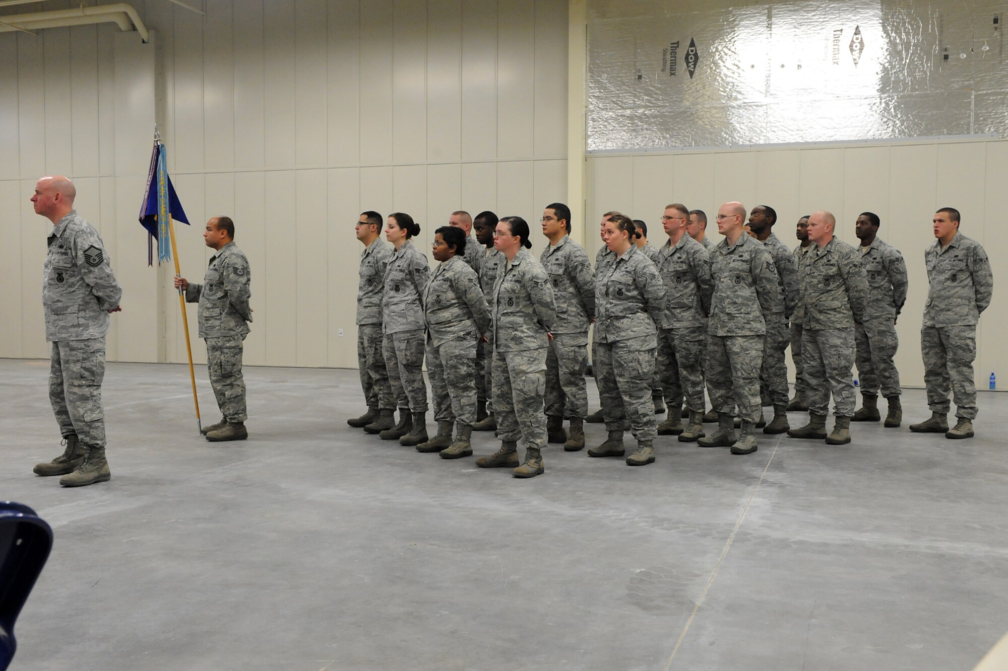 Members of the 75th Security Forces Squadron stand in formation at the ceremony held Jan. 18 to formally open the building. (U.S. Air Force photo by: Alex Llyod)