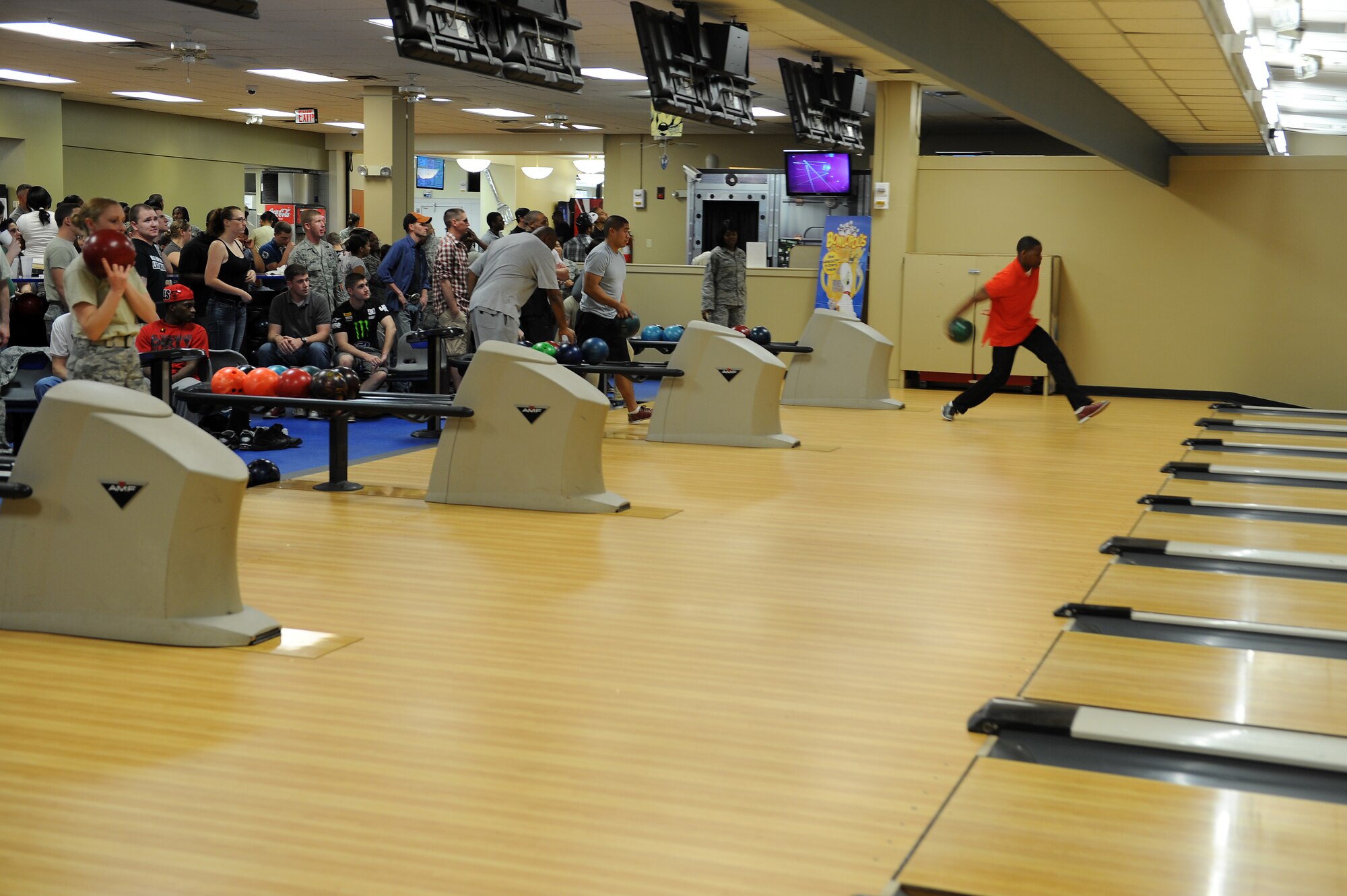 U.S. Air Force Airmen participate in a bowling tournament to honor Dr. Martin Luther King Jr. at The Spot at Moody Air Force Base, Ga., Jan. 26, 2012. Each team 
comprised of at least one female and included various diversities representing what MLK stood for. (U.S. Air Force photo by Staff Sgt. Ciara Wymbs/Released) 
various
