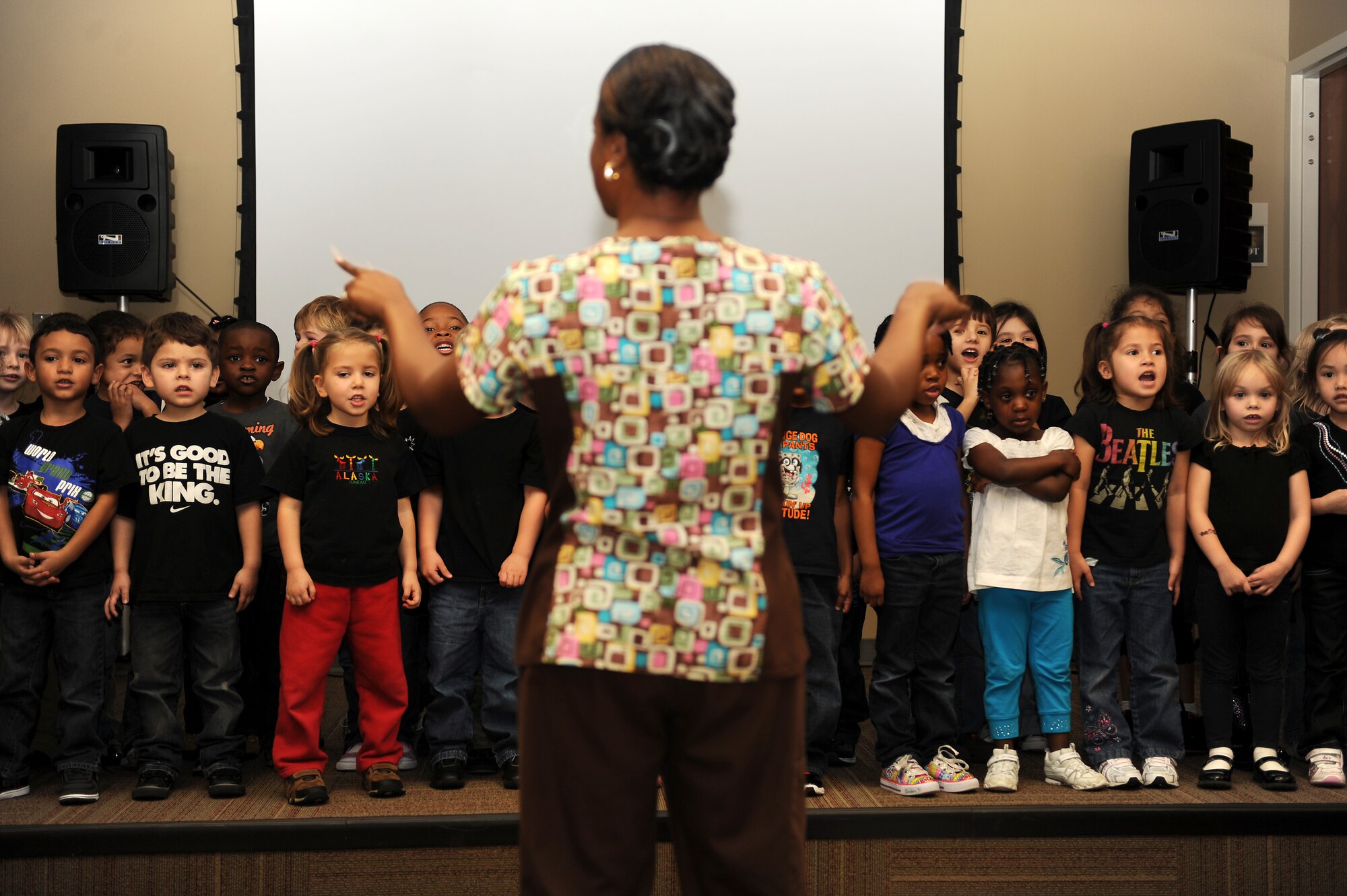 Preschoolers from the child development center sing the happy birthday song at 
The Spot during a Martin Luther King Jr. celebration event at Moody Air Force Base, Ga., Jan. 26, 2012. The event included a bowling tournament, ping pong tournament, a laser maze and a spades card game tournament. (U.S. Air Force photo by Staff Sgt. Ciara Wymbs/Released)
