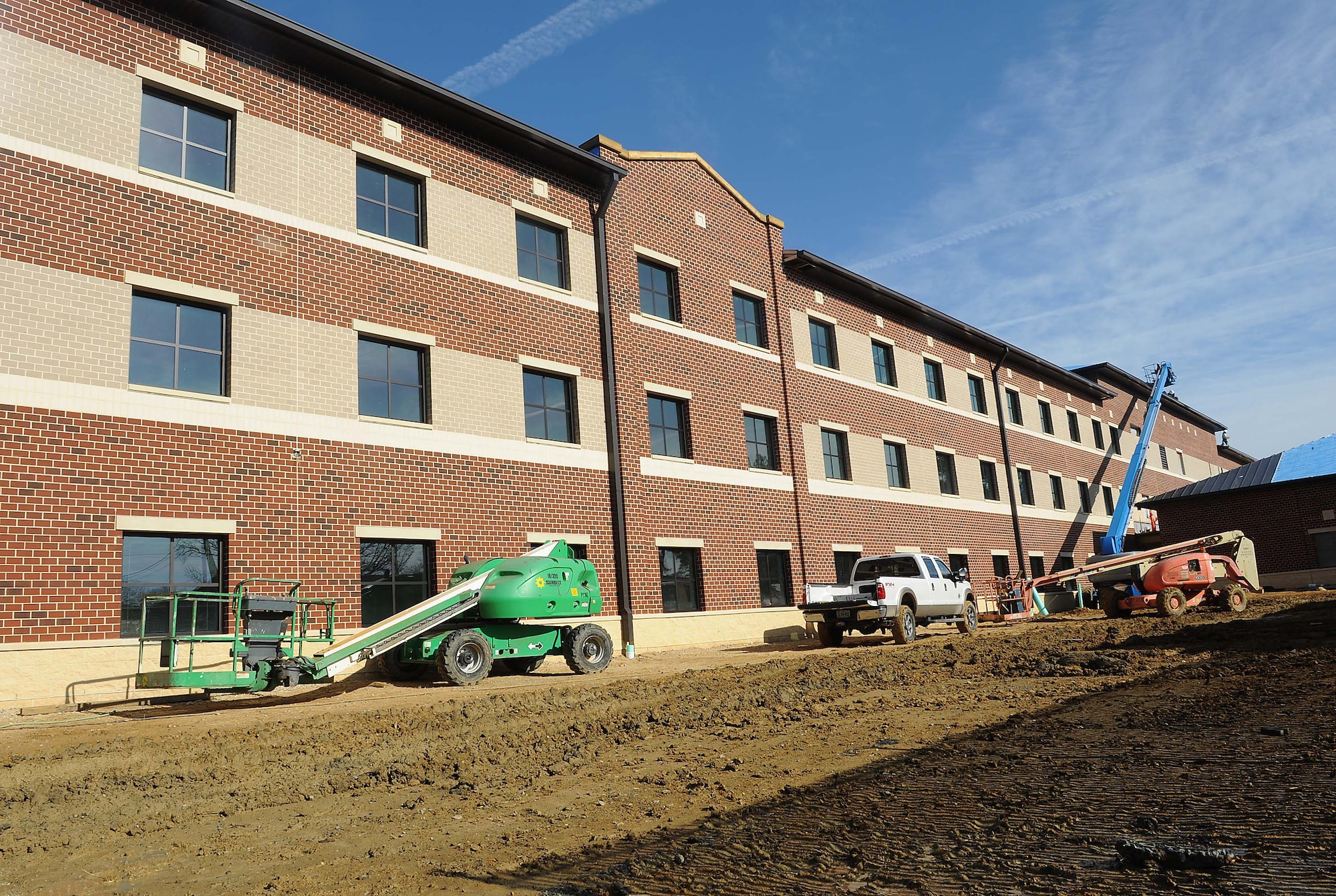 Balfour Beatty teams continue construction on new AIT-Phase 1 barracks located on Marshall Street at Fort Eustis, Va., Jan. 24, 2012. This new dorm is expected to house 300 with a surge of up to 450 soldiers. (U.S. Air Force photo by Staff Sgt. Antoinette Gibson/Released)
