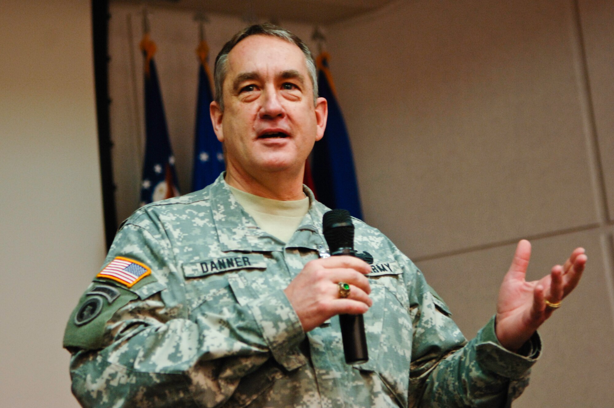 Maj. Gen. Stephen Danner, Missouri National Guard adjutant general, speaks during the opening ceremony at the 30th Annual Tactics and Intelligence Symposium hosted by the Advanced Airlift Tactics Training Center at Rosecrans Air National Guard Base, St. Joseph, Mo., Jan. 24, 2012. The symposium brings together members of the airlift community from across the world. (Missouri Air National Guard photo by Tech. Sgt. Erin Hickok)