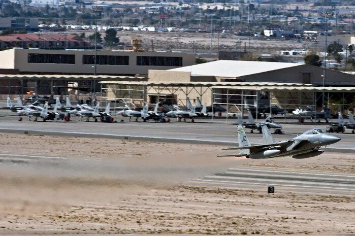 A Lousiana Air National Guard F-15 Strike Eagle departs for a training mission over the Nevada Test and Training Range during Red Flag 12-2 Jan. 27, 2012, at Nellis Air Force Base, Nev. Red Flag is a realistic combat training exercise involving the air forces of the United States and its allies. The exercise is hosted north of Las Vegas on the NTTR. (U.S. Air Force photo by Senior Airman Brett Clashman)
