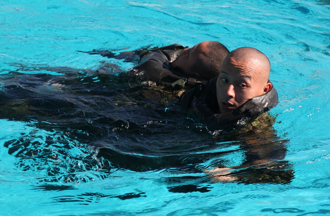 Soldiers from the Japanese Ground Self Defense Force practice simulated casualty drills during a helocast preparation exercise aboard Camp Pendleton, Calif., Jan. 28, 2011. The event was part of Exercise Iron Fist 2012, a bilateral amphibious training exercise between the 15th Marine Expeditionary Unit and the JGSDF.