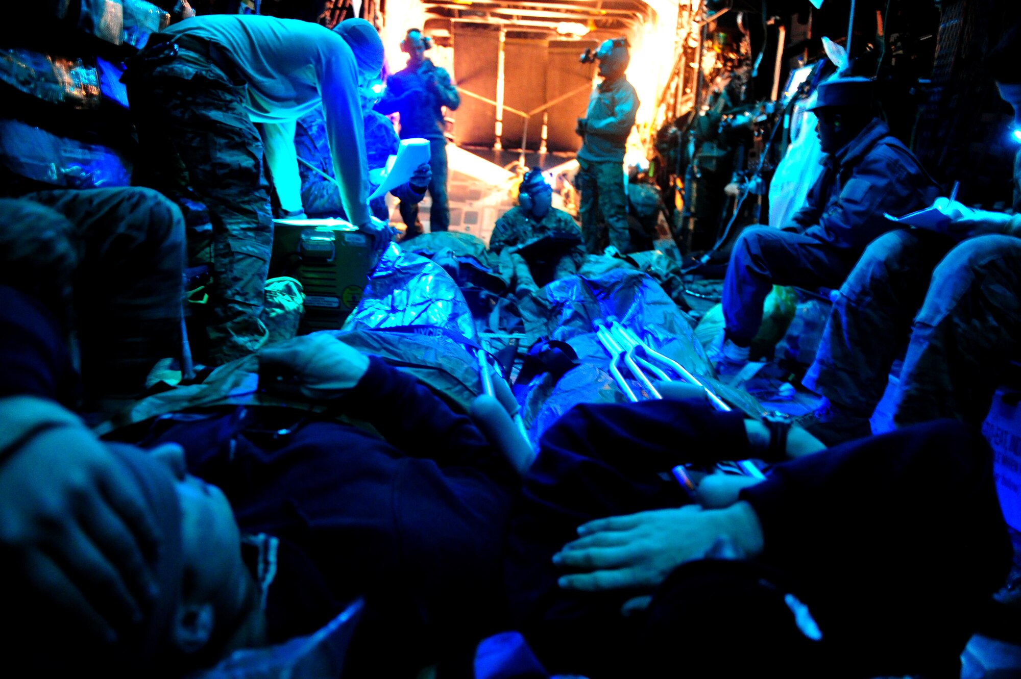 CAMP BASTION, Afghanistan – Airmen assigned to the 76th Expeditionary Rescue Squadron close the back of a packed HC-130 as it prepares to transport patients for a medical evacuation. The 76th ERQS serves as an ambulance of the air for Operation ENDURING FREEDOM. The squadron’s mission is to provide medical or casualty evacuation and personnel recovery for U.S. and coalition forces, Afghan National Security Forces and local nationals in all of the regional commands in Afghanistan. (U.S. Air Force photo/Senior Airman Tyler Placie)