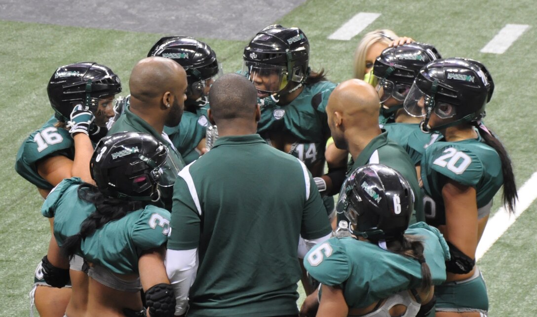 The Lingerie Football League’s Philadelphia Passion huddles for a timeout taken during the 2012 Eastern Conference Championship held at the Citizens Business Bank Arena in Ontario, Calif., Jan 29. The Single Marine Program of the Marine Corps Logistics Base Barstow attended the event, which featured a championship for both the East and West Coast.